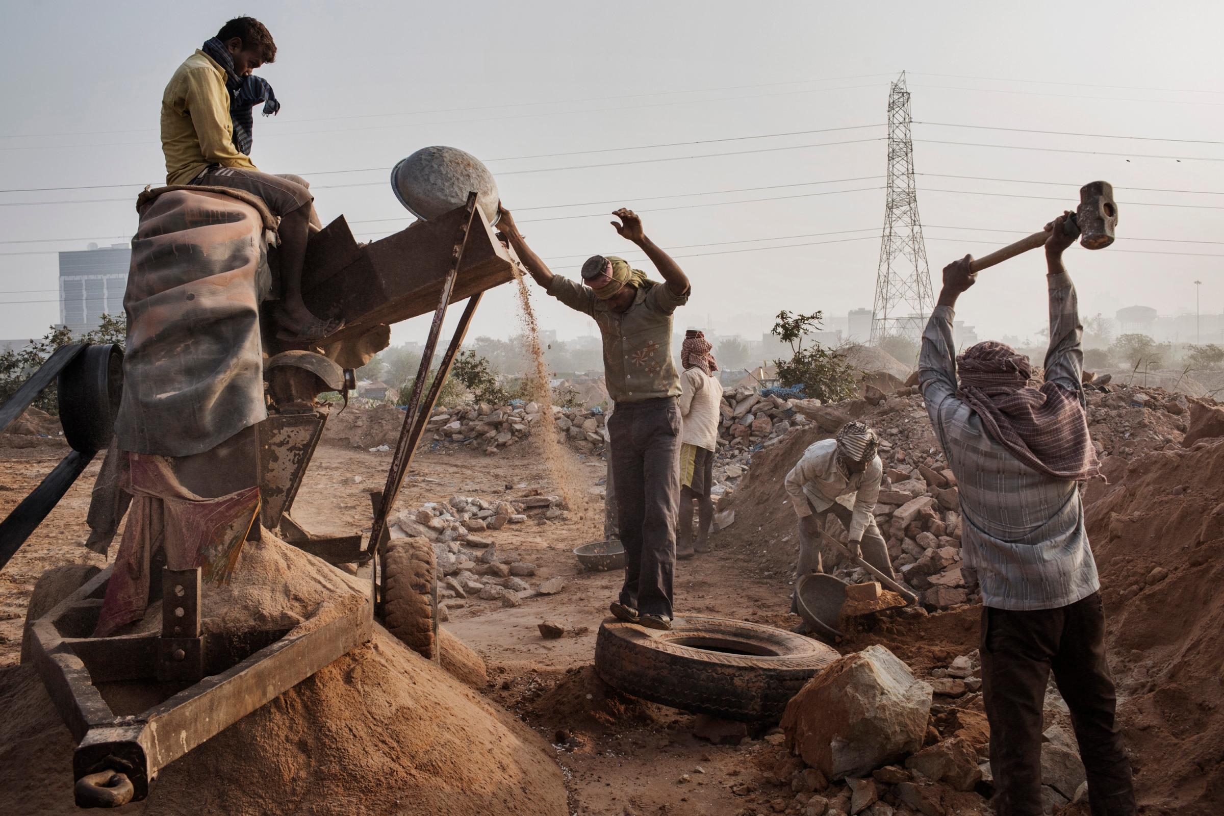 WIRED: The Deadly Global War for Sand Indian workers crush stone into sand at an illegal mine near Raipur Village in India on March 18, 2015.