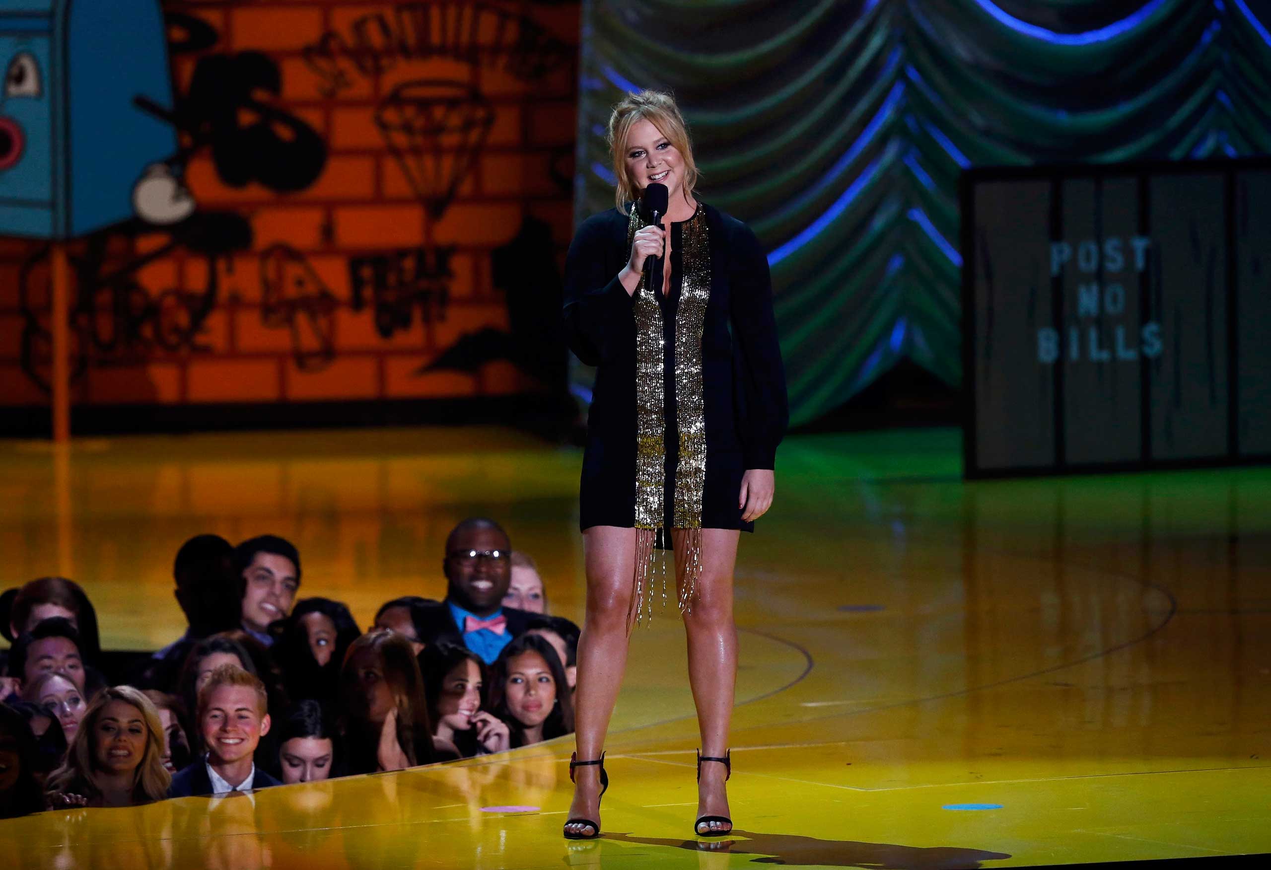 Host Amy Schumer opens the show at the 2015 MTV Movie Awards in Los Angeles on Apr. 12, 2015.