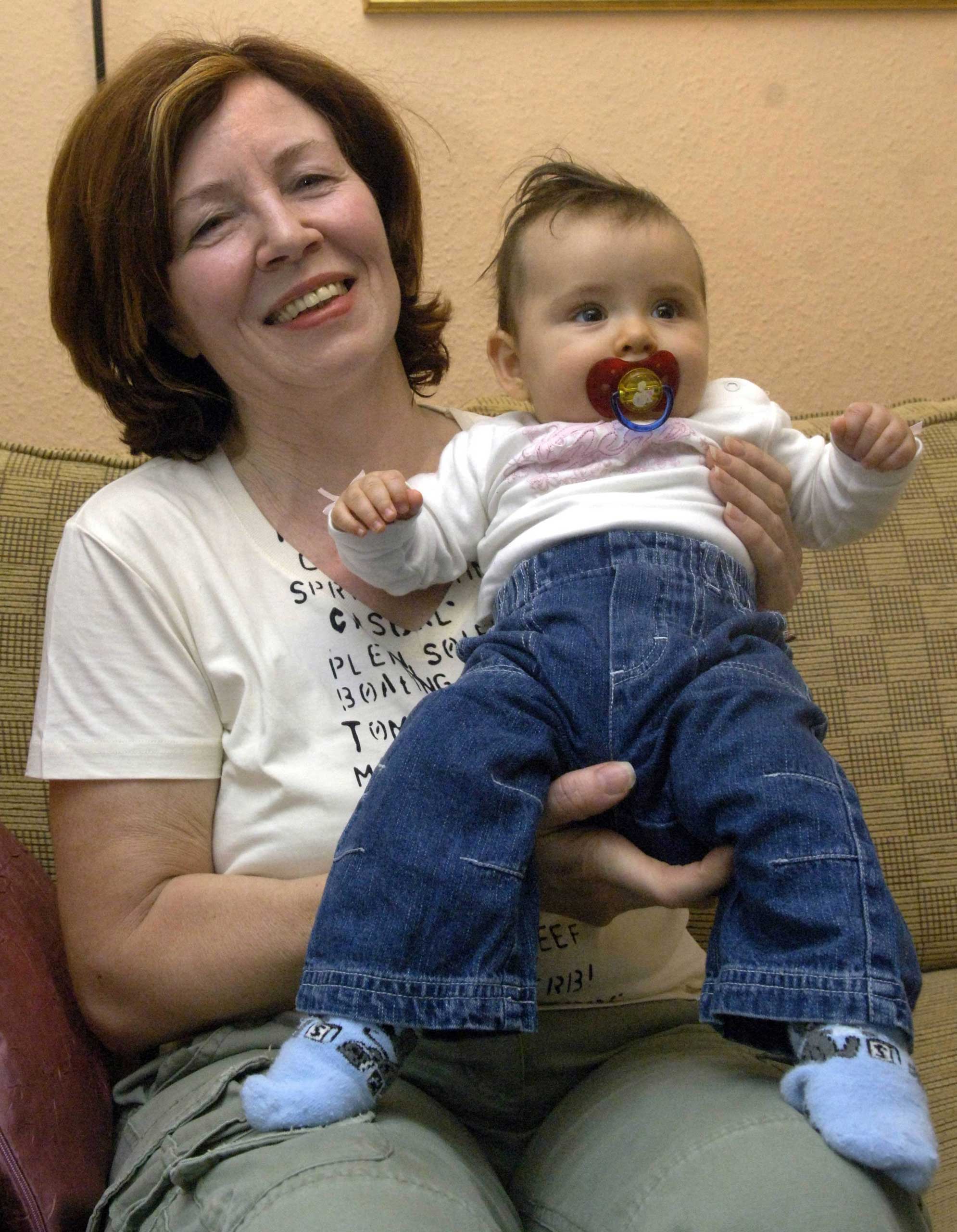 Annegret Raunigk, then 55-years-old, poses with her daughter Leila in Berlin on Nov. 3, 2005. (Patrick Lux—EPA)