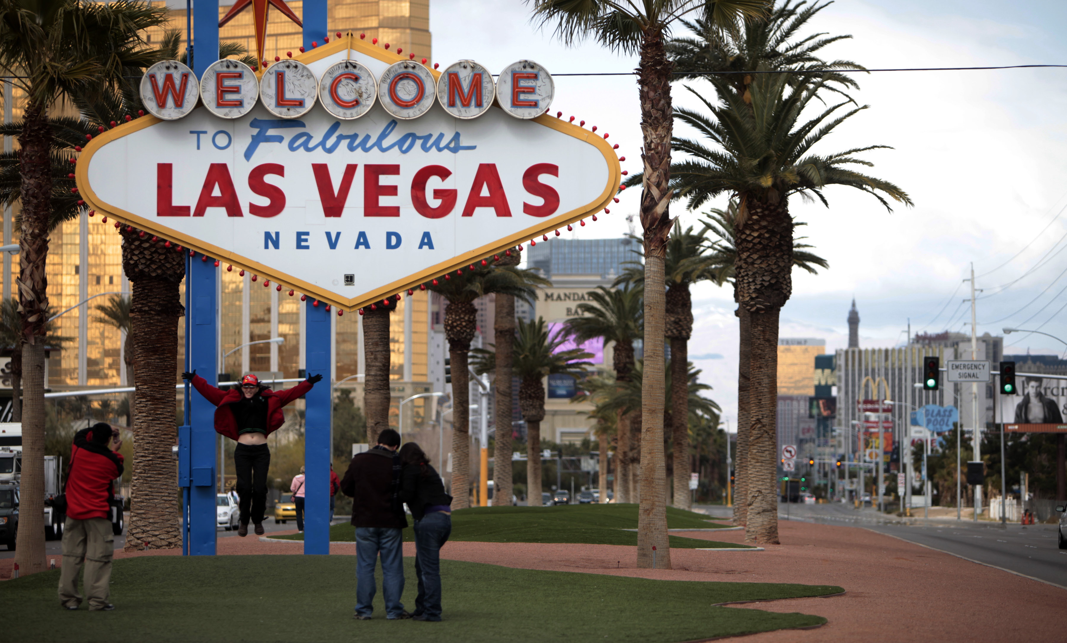 Tourists take pictures on Feb 12, 2009 in front of the "Welcome to Fabulous Las Vegas" neon sign in Las Vegas. (Jae C. Hong—AP)
