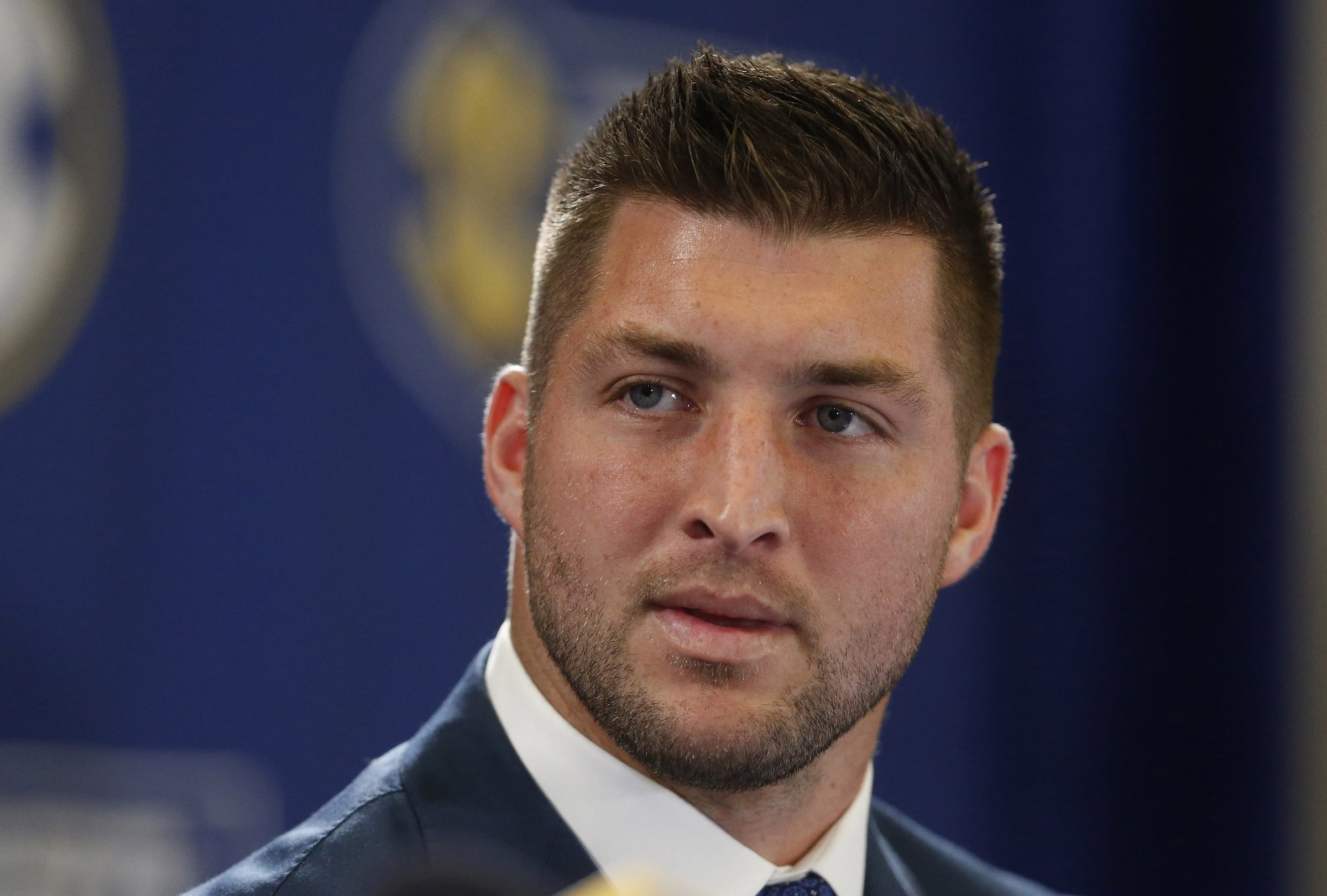 Tim Tebow speaks during a television broadcast in Atlanta on Dec. 5, 2014.