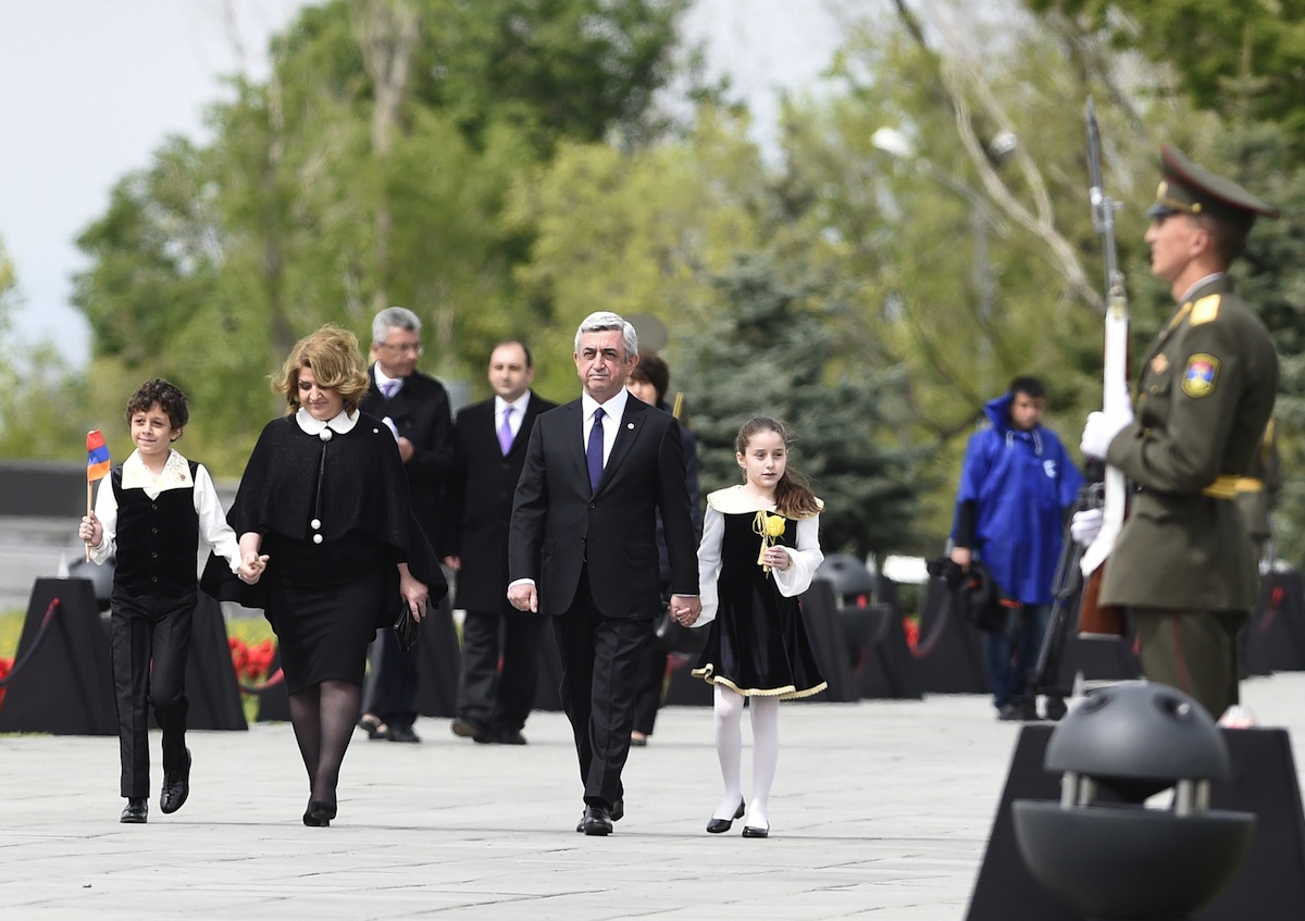 Armenian president Serge Sarkissian (2-R), his wife Rita (2-L) and their children arrive for a ceremony at the Genocide Memorial in Yerevan on April 24, 2015. (Alain Jocard—AFP/Getty Images)