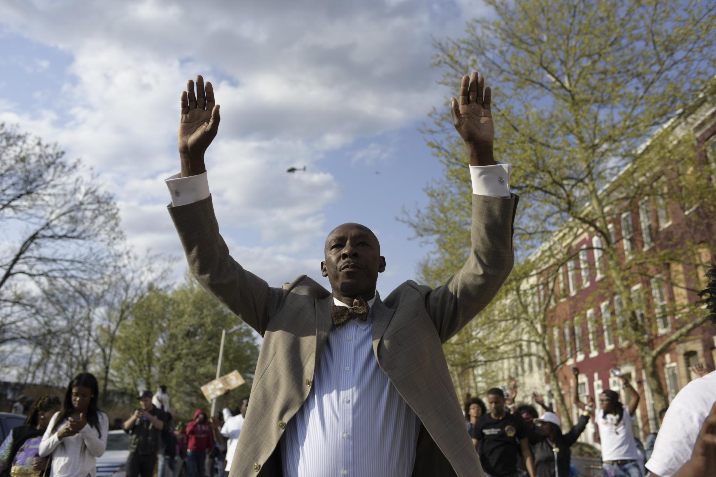 Edward Mazyck and hundreds of other protesters march through Baltimore over the death of Freddie Gray, who died after suffering a severe spinal cord injury in police custody.