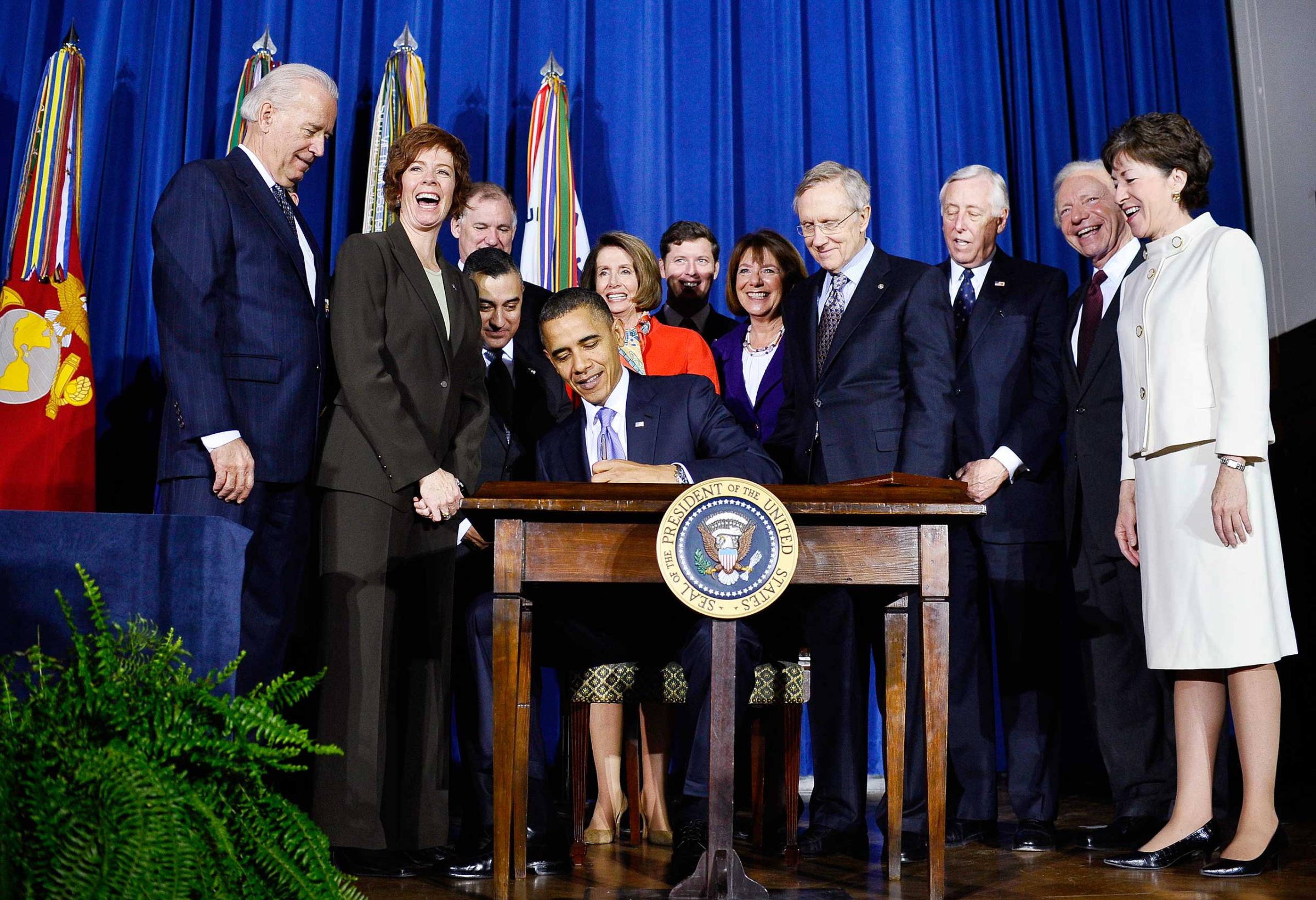 President Barack Obama signs the Don't Ask, Don't Tell Repeal Act of 2010 into law at the Department of the Interior in Washington on Dec. 22, 2010.
