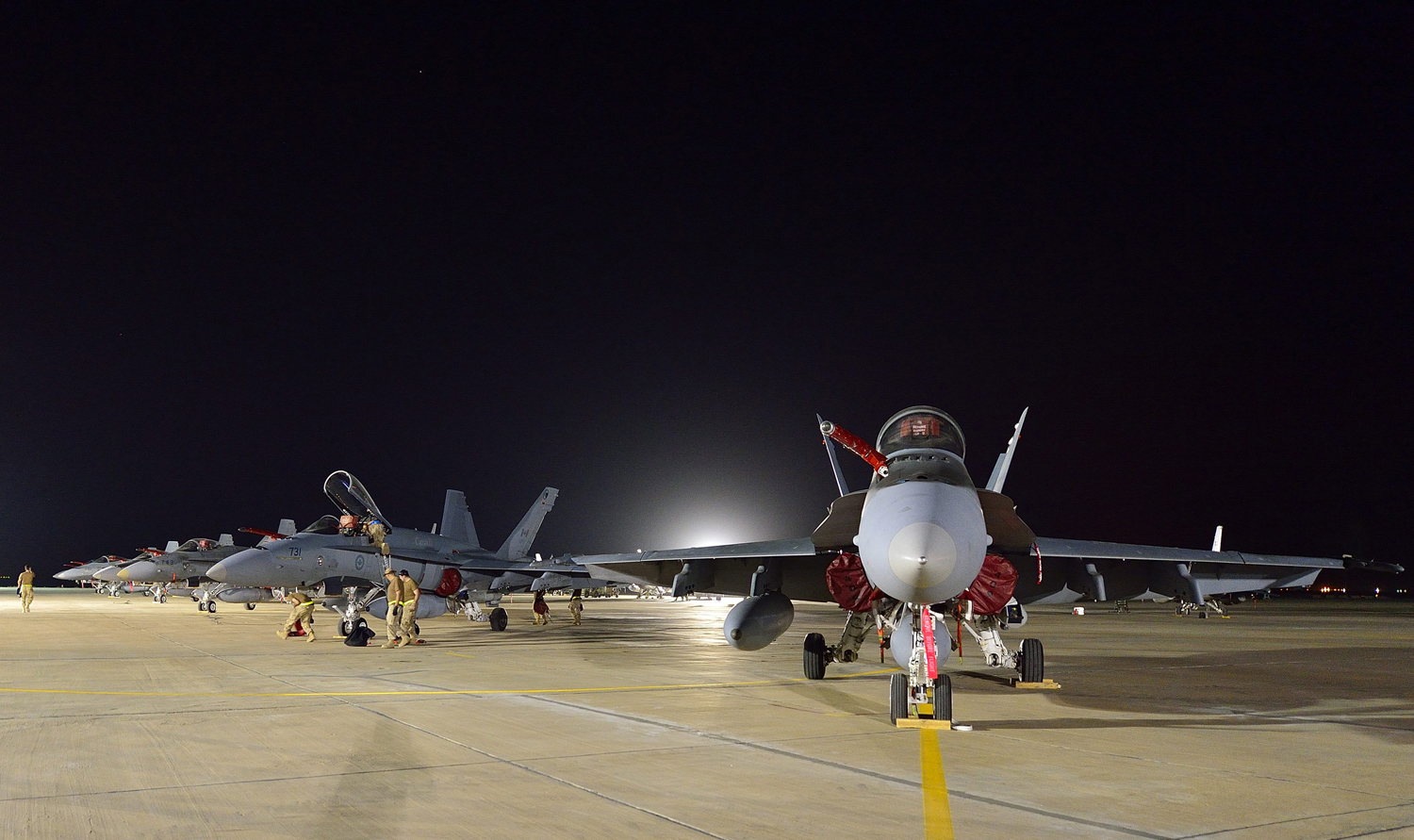 A Canadian Armed Forces CF-18 Fighter jets arrive at the Canadian Air Task Force Flight Operations Area in Kuwait