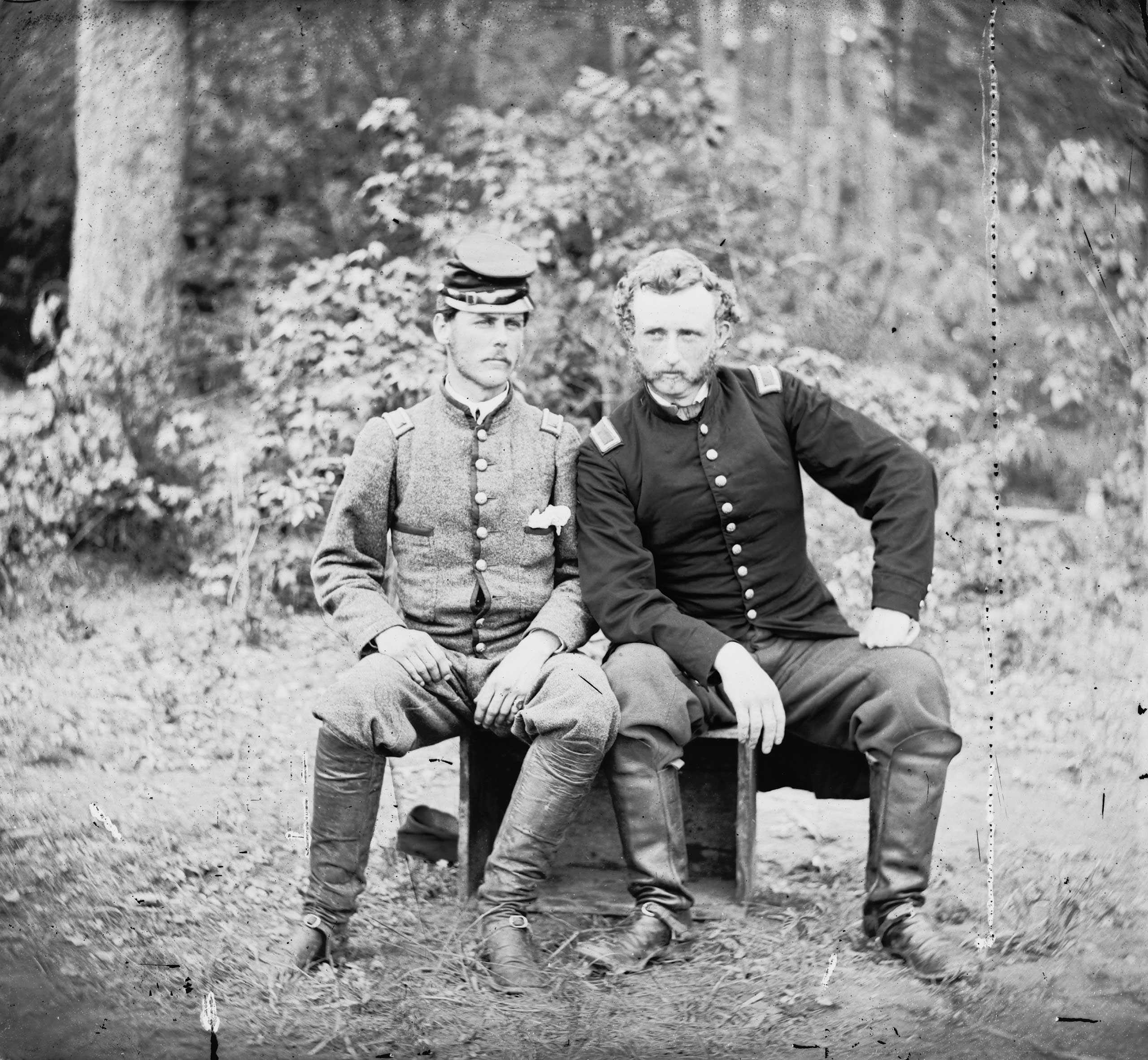 Capt. Custer of the 5th Cavalry is seen with Lt. Washington, a prisoner and former classmate.