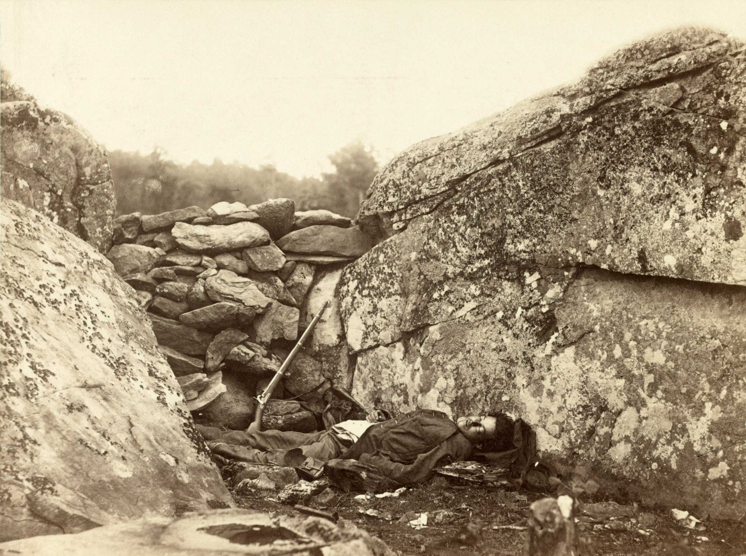 Dead Confederate sharpshooter at foot of Little Round Top on the battlefield at Gettysburg, July, 1863