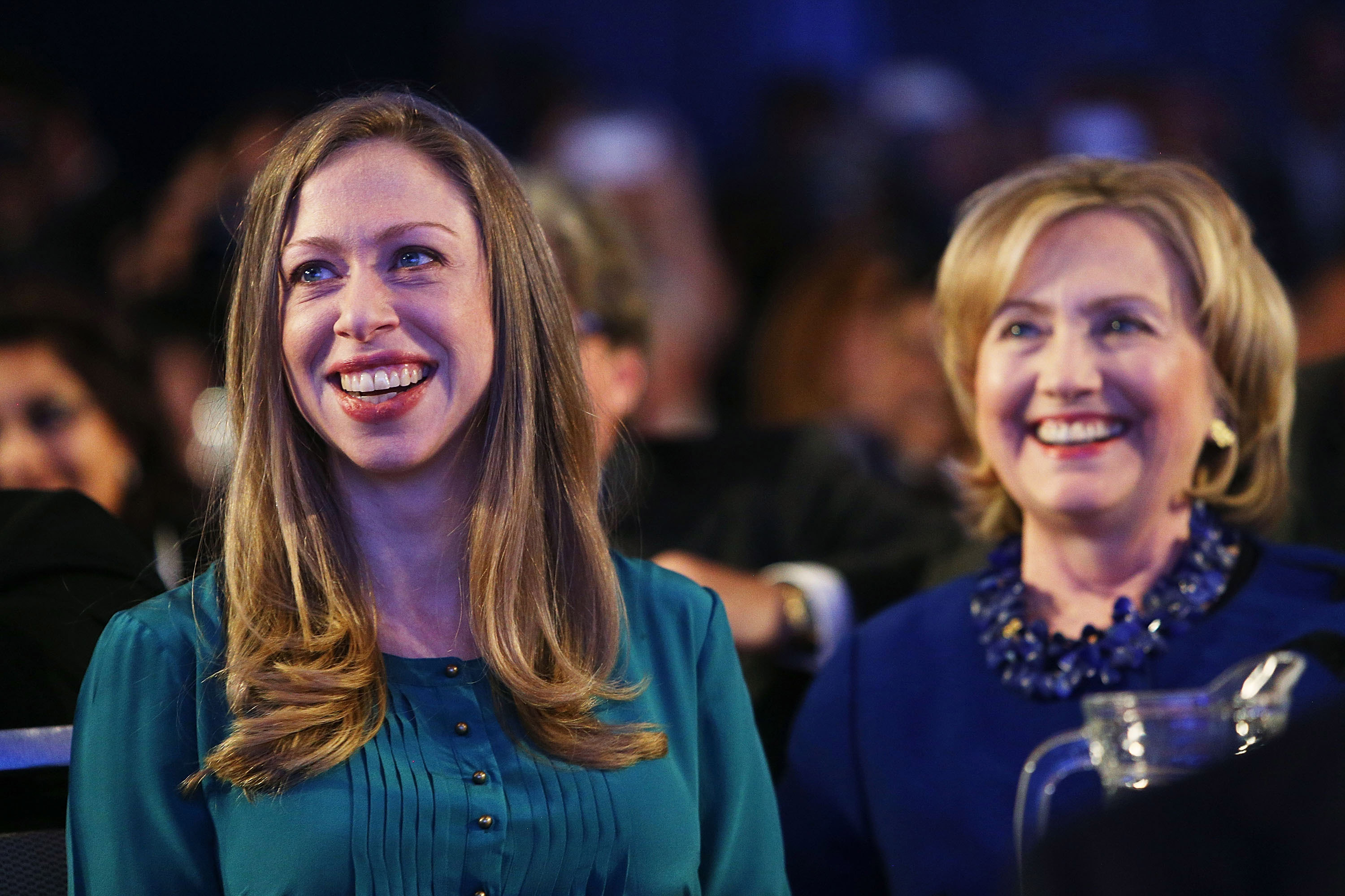 Former U.S. Secretary of State Hillary Clinton and daughter Chelsea Clinton are viewed in the audience as U.S. President Barack Obama, who is in New York City for the 69th Session of the United Nations General Assembly, speaks at the Clinton Global Initiative on September 23, 2014 in New York City. (Spencer Platt—Getty Images)