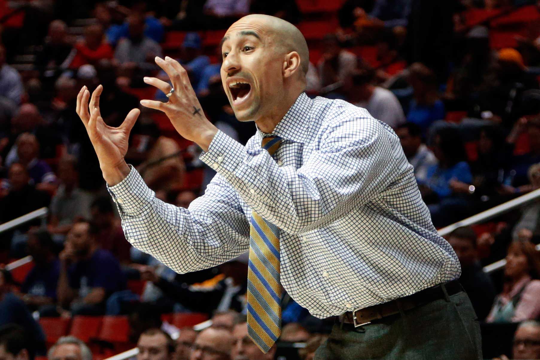 Virginia Commonwealth head coach Shaka Smart gestures as his team plays Stephen F. Austin in the first half of a second-round game in the NCAA college basketball tournament in San Diego, March 21, 2014.