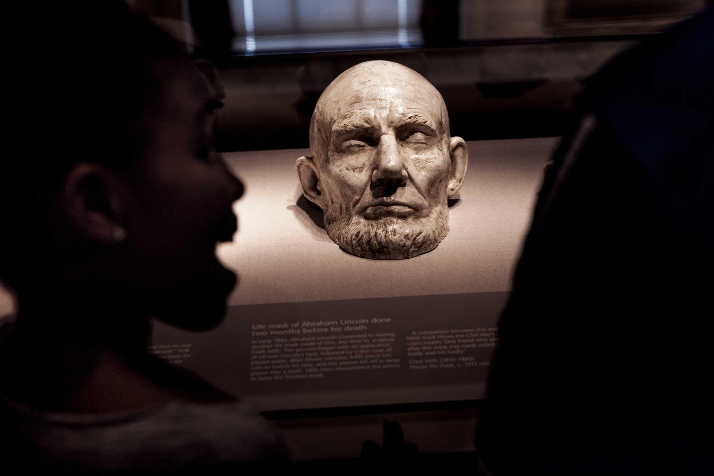 From the April issue of National Geographic magazine: Lincoln Children in Washington, D.C., view a plaster cast of a life mask of Lincoln’s face, made nine weeks before his death in April 1865.