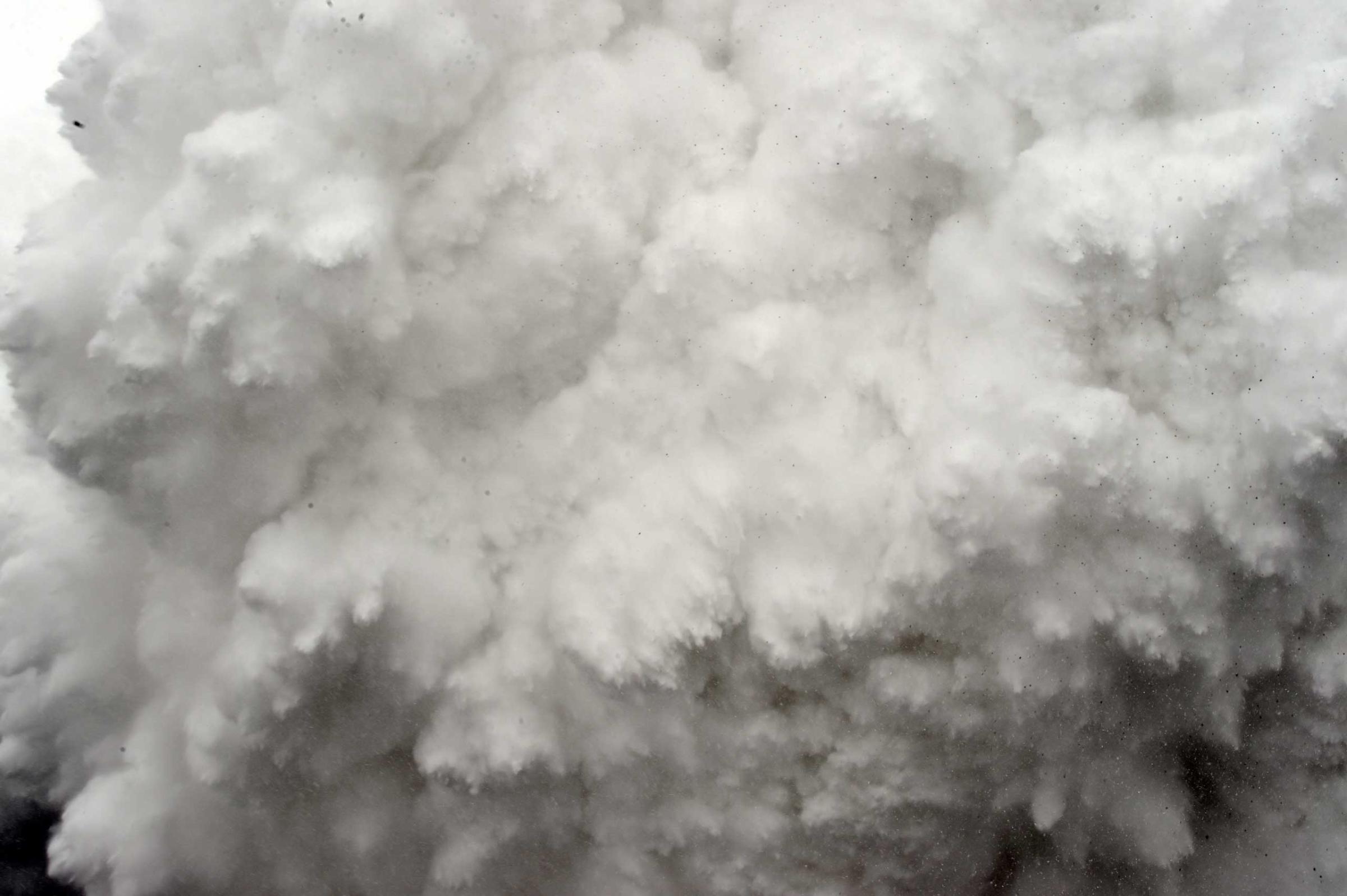 A cloud of snow and debris triggered by an earthquake flies towards Everest Base Camp, moments before parts of the camp were flattened, in the Himalayas, Nepal, on April 25, 2015.