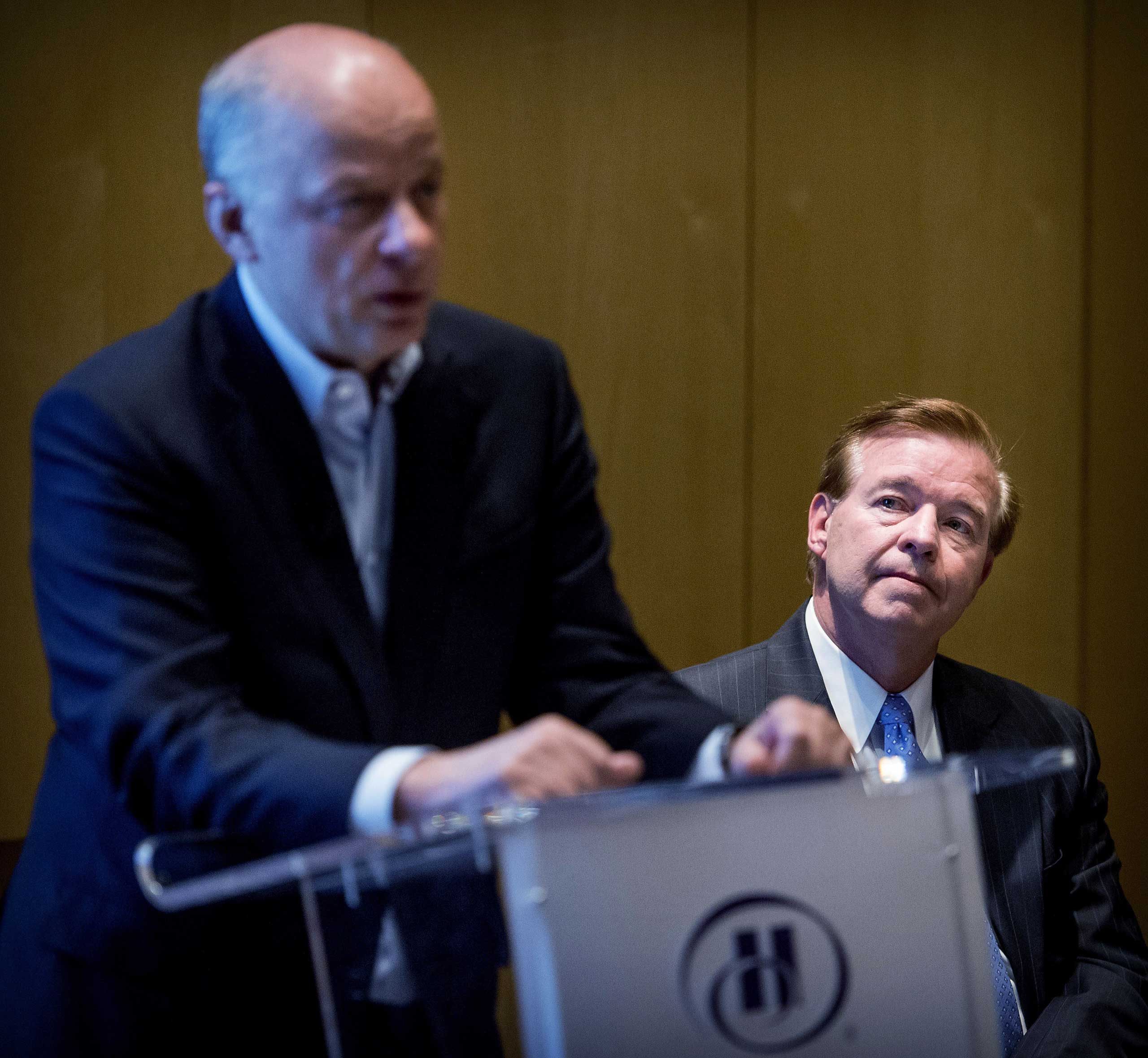David J. Bronczek (R), president and chief executive officer of FedEx Express, and Tex Gunning (L), CEO of the Dutch TNT Express attend a press conference in Amsterdam on April 7, 2015, regarding the acquisition of TNT by the US FedEx. (Koen Van Weel—AFP/Getty Images)