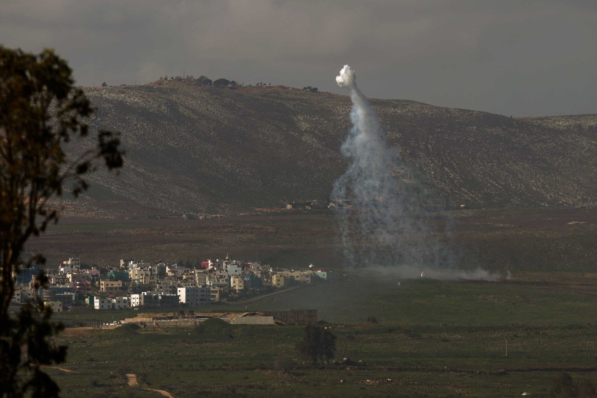 Smoke rises next to the village of Ghajar on the Israeli-Lebanese border, as a result of the fire exchange between the Israeli and Hezbollah militant group on Jan. 28, 2015.