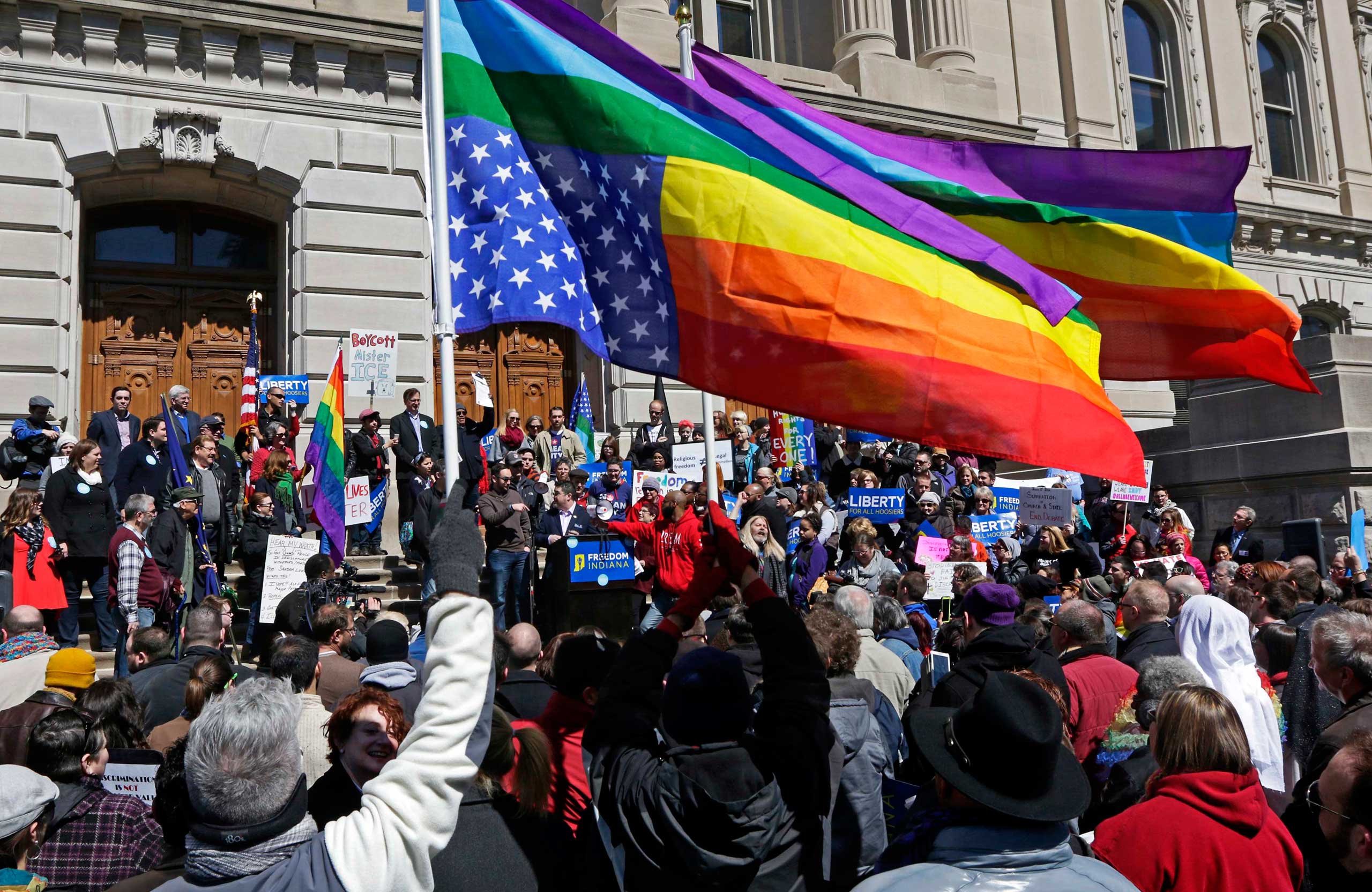 Demonstrators gather to protest a controversial religious freedom bill recently signed by Governor Mike Pence, during a rally at Monument Circle in Indianapolis on March 28, 2015.