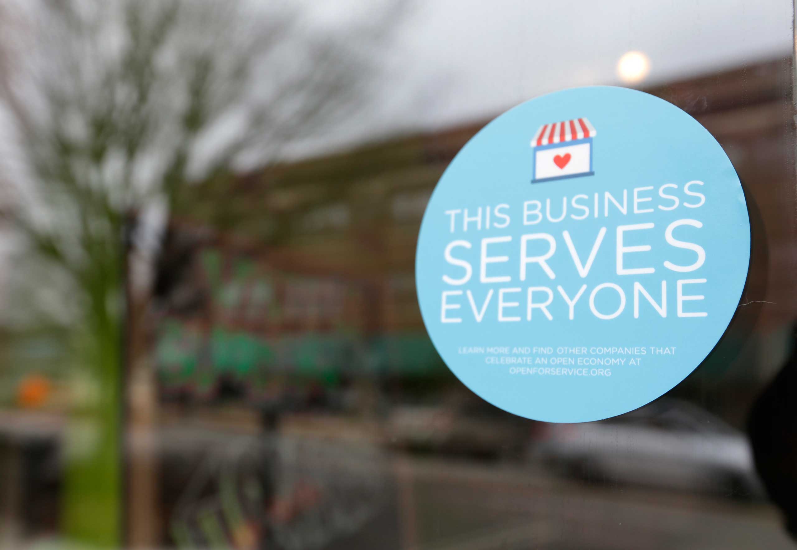 A window sticker on a downtown Indianapolis business, Wednesday, March 25, 2015, shows its objection to the Religious Freedom bill passed by the Indiana legislature. (Michael Conroy—AP)