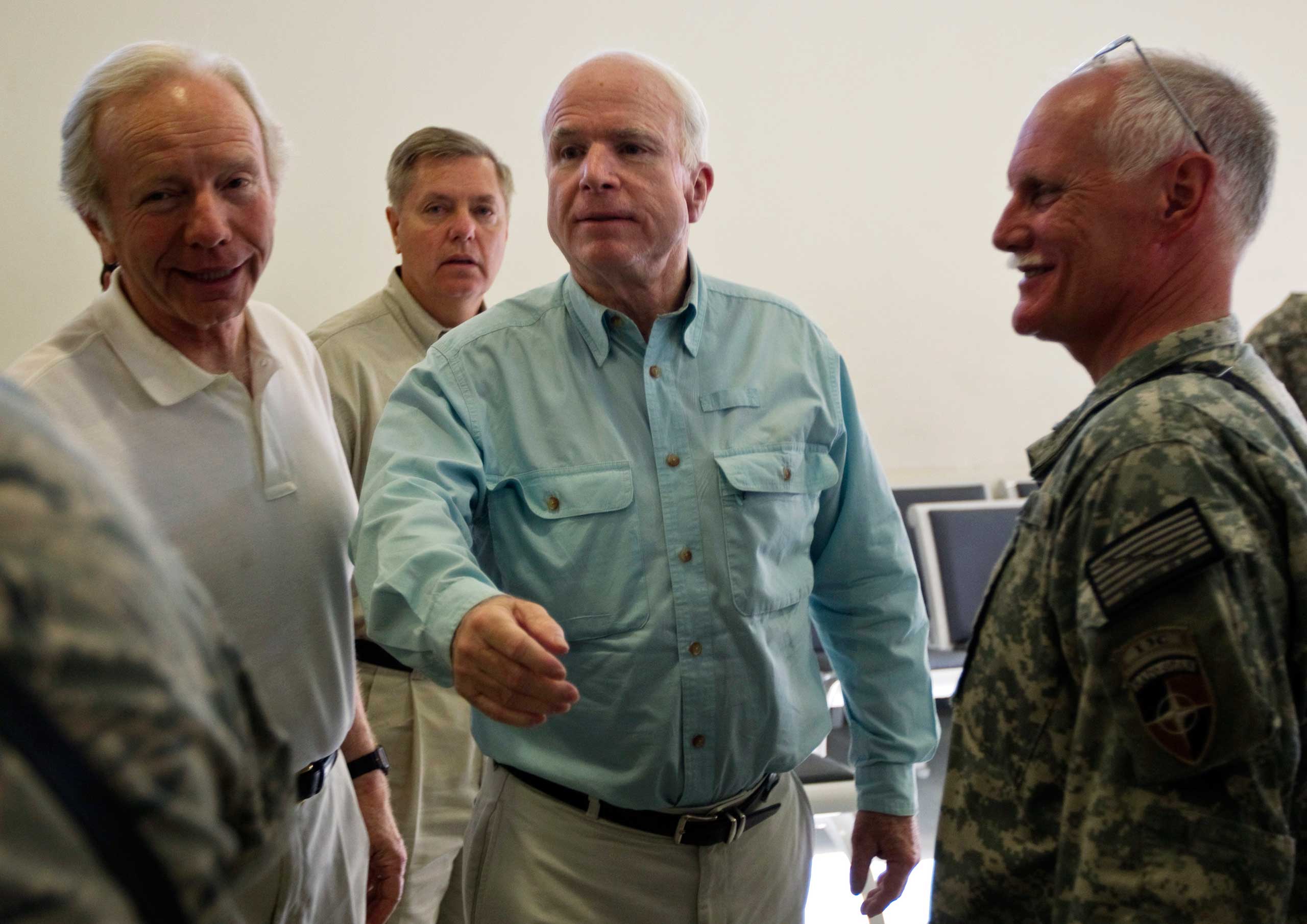 Though Lieberman is a Democrat-turned-independent and Graham and McCain are Republicans, the three Senators, shown here on a 2010 trip to Afghanistan, share similar views on a muscular foreign policy.