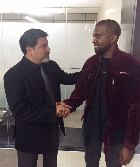 Videographer Daniel Ramos and Kanye West shaking hands after West apologized to Ramos as part of a settlement, in March 2015 in Los Angeles.