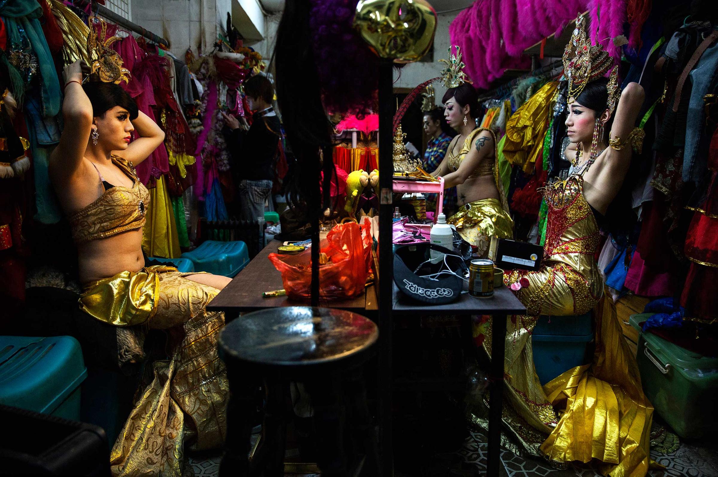 Chinese drag queens get ready backstage before performing at the Chunai 98 club in Nanning, Guangxi Province, southern China, on January 10, 2015.