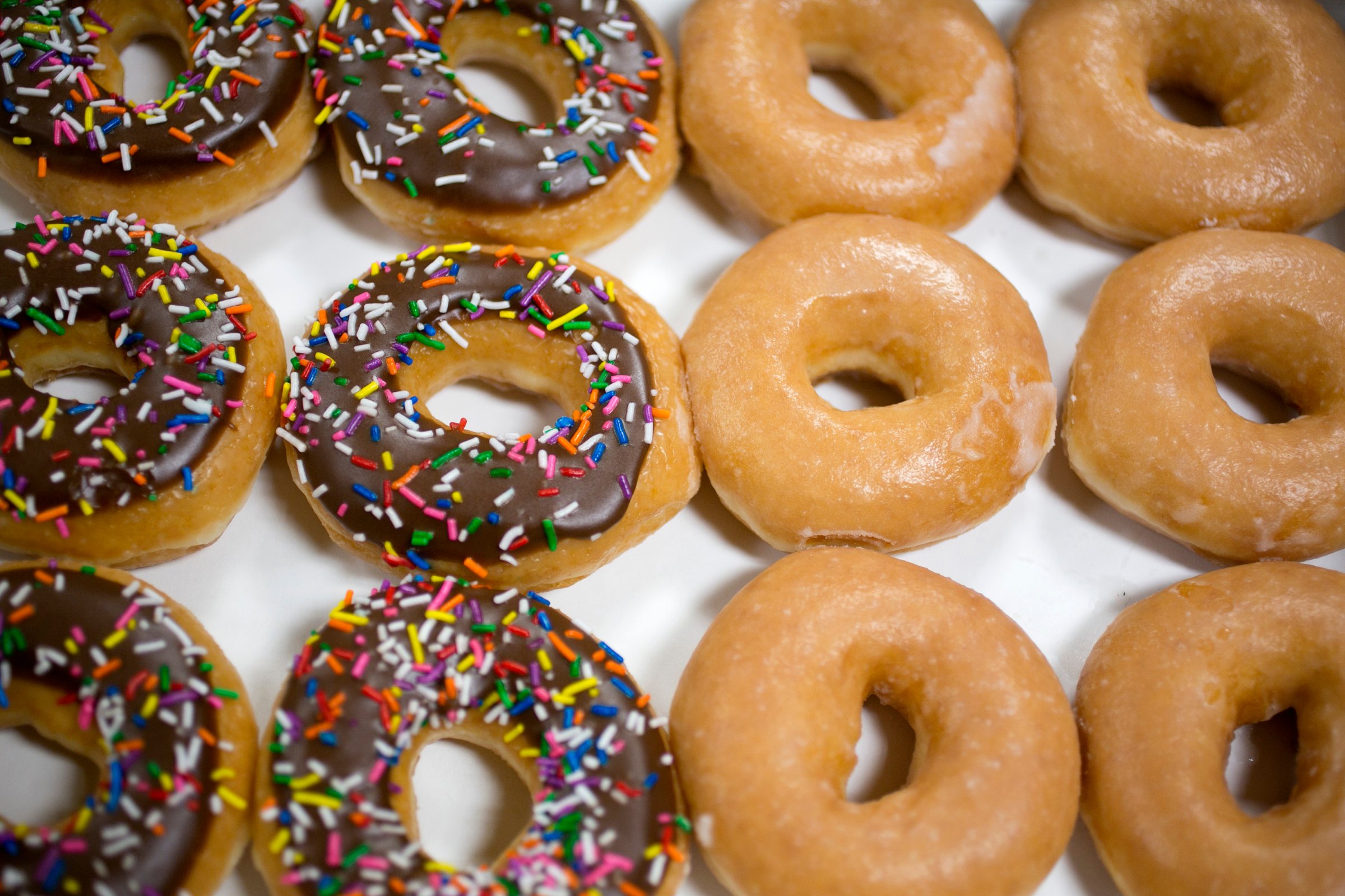 A box of Krispy Kreme Doughnuts Inc. doughnuts is arranged for a photograph in Washington, D.C.