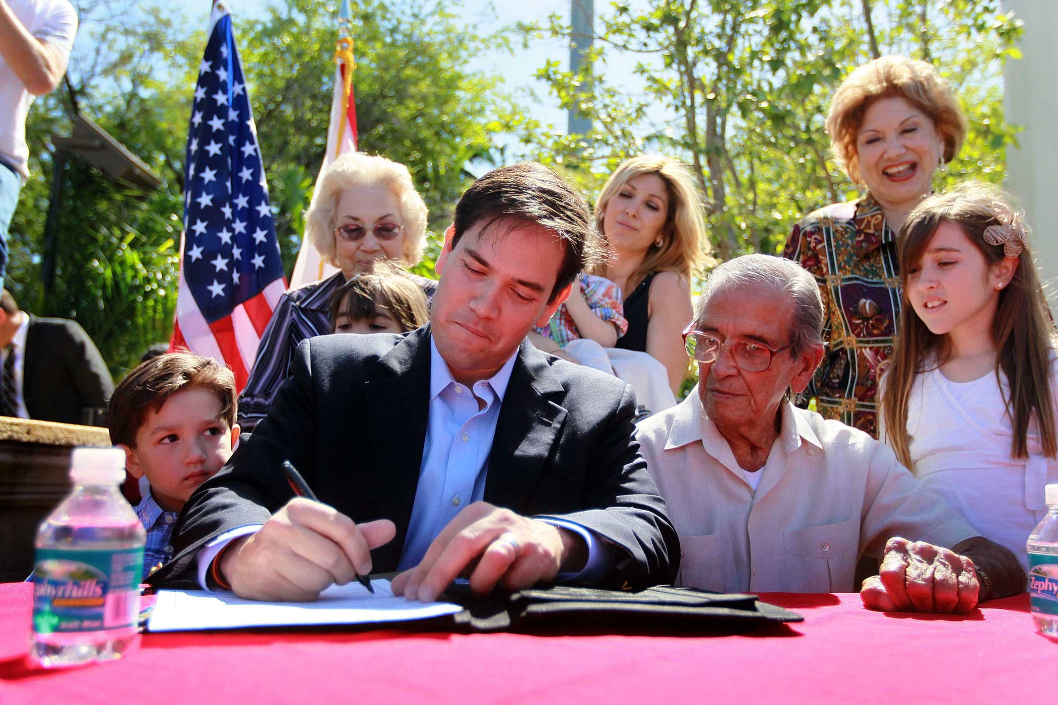 Marco Rubio with his son, Anthony Rubio, father, Mario Rubio and daughter Amanda Rubio as he signs election documents officially qualifying him as a Republican candidate for the U.S. Senate on April 27, 2010 in Miami, Fla.