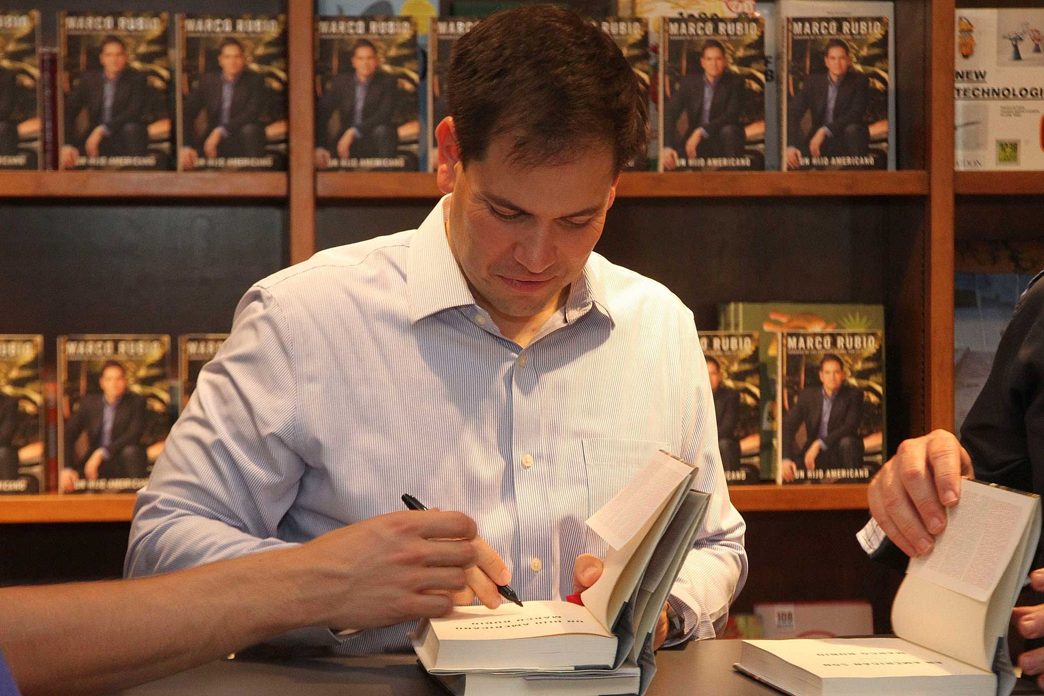 Senator Marco Rubio greets fans and signs copies of his book  An American Son  at Books and Books in Coral Gables, Fla., on June 30, 2012.