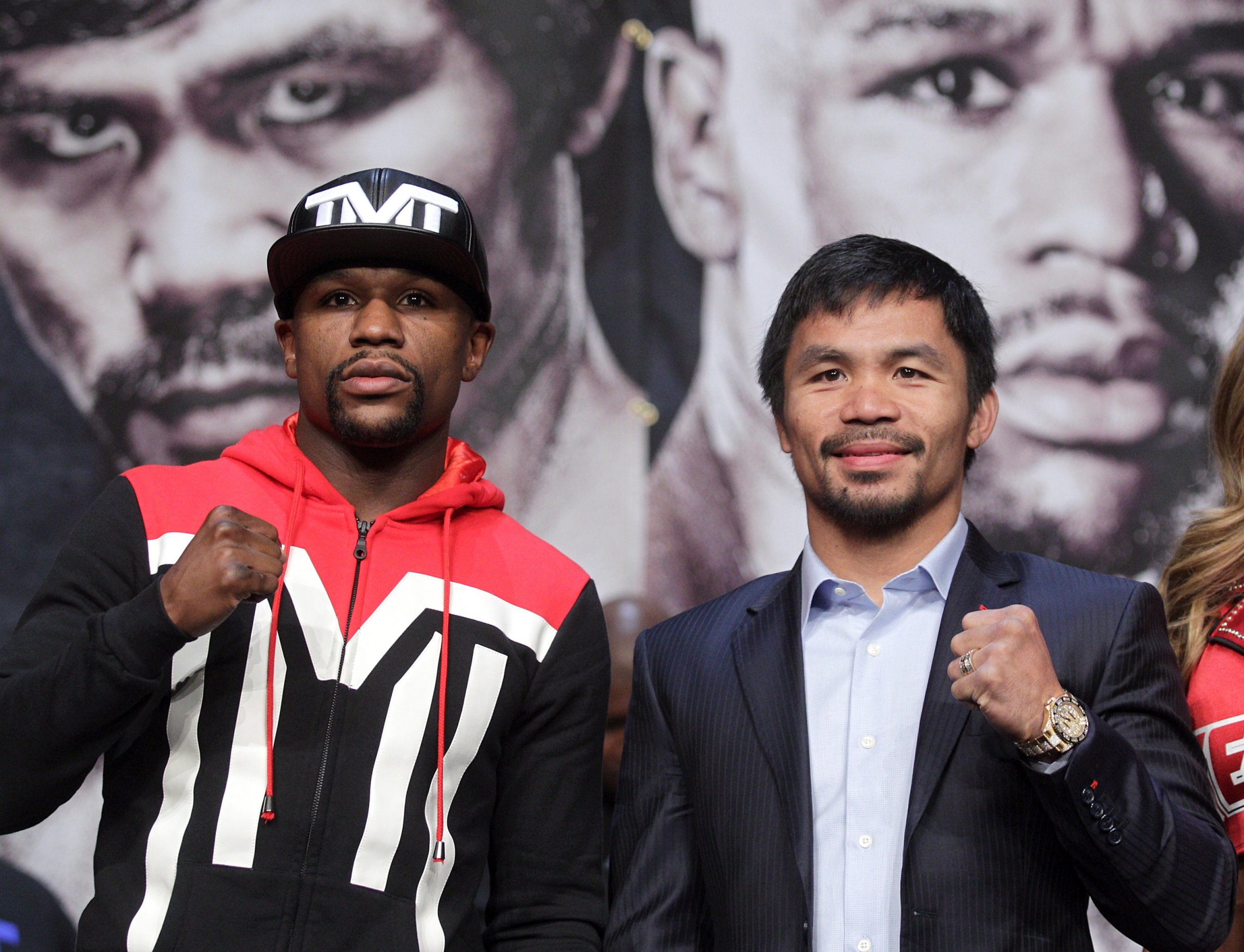 Enjoy it now, guys: Mayweather (left) and Pacquiao are heading for a brain pounding