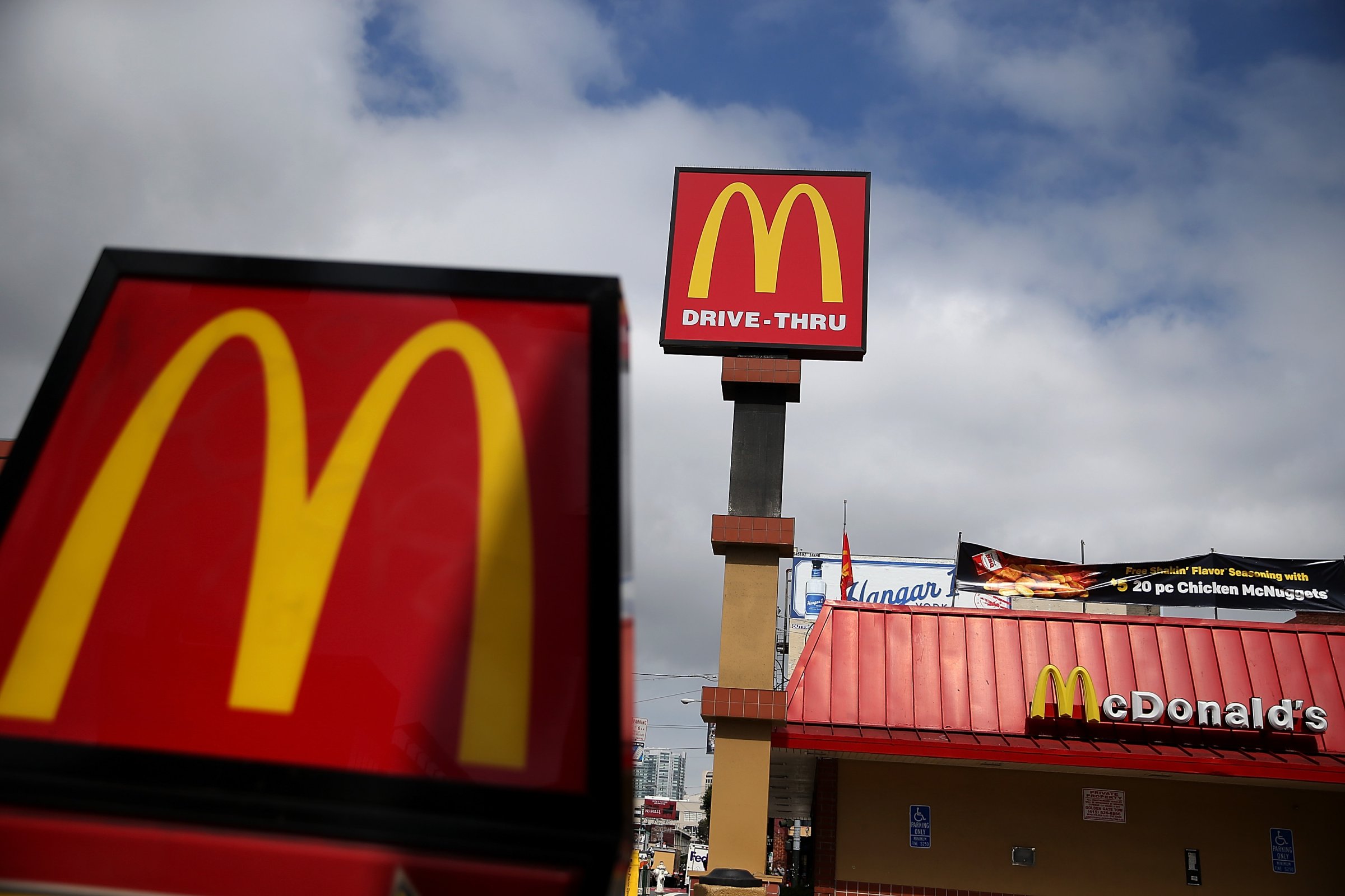 Signs are posted on the exterior of a McDonald's restaurant on April 22, 2015 in San Francisco.
