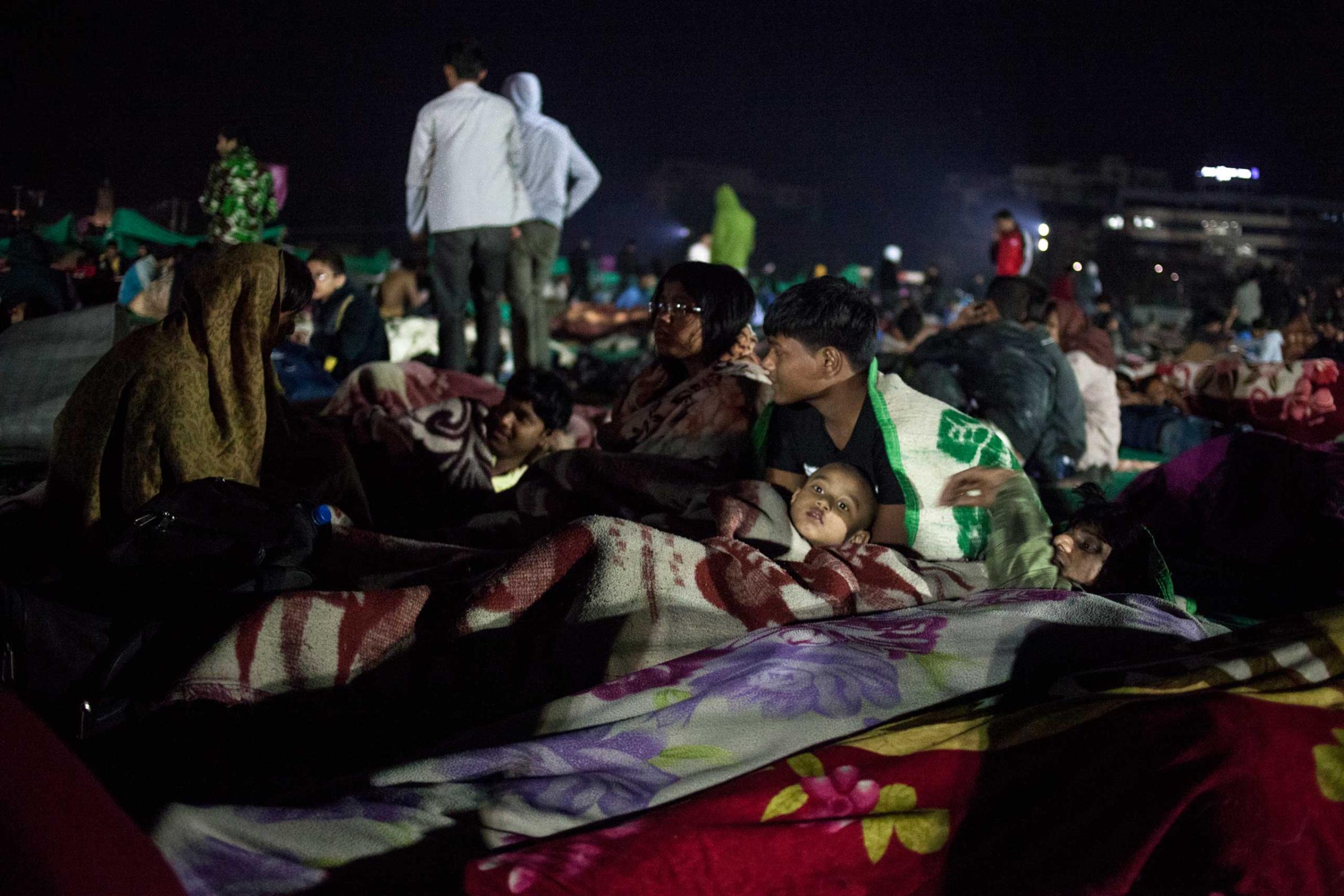 People gathered at Tundikhel, an open ground in central Kathmandu, Nepal, on April 25, 2015. Many families spent their nights there in fear of aftershocks.