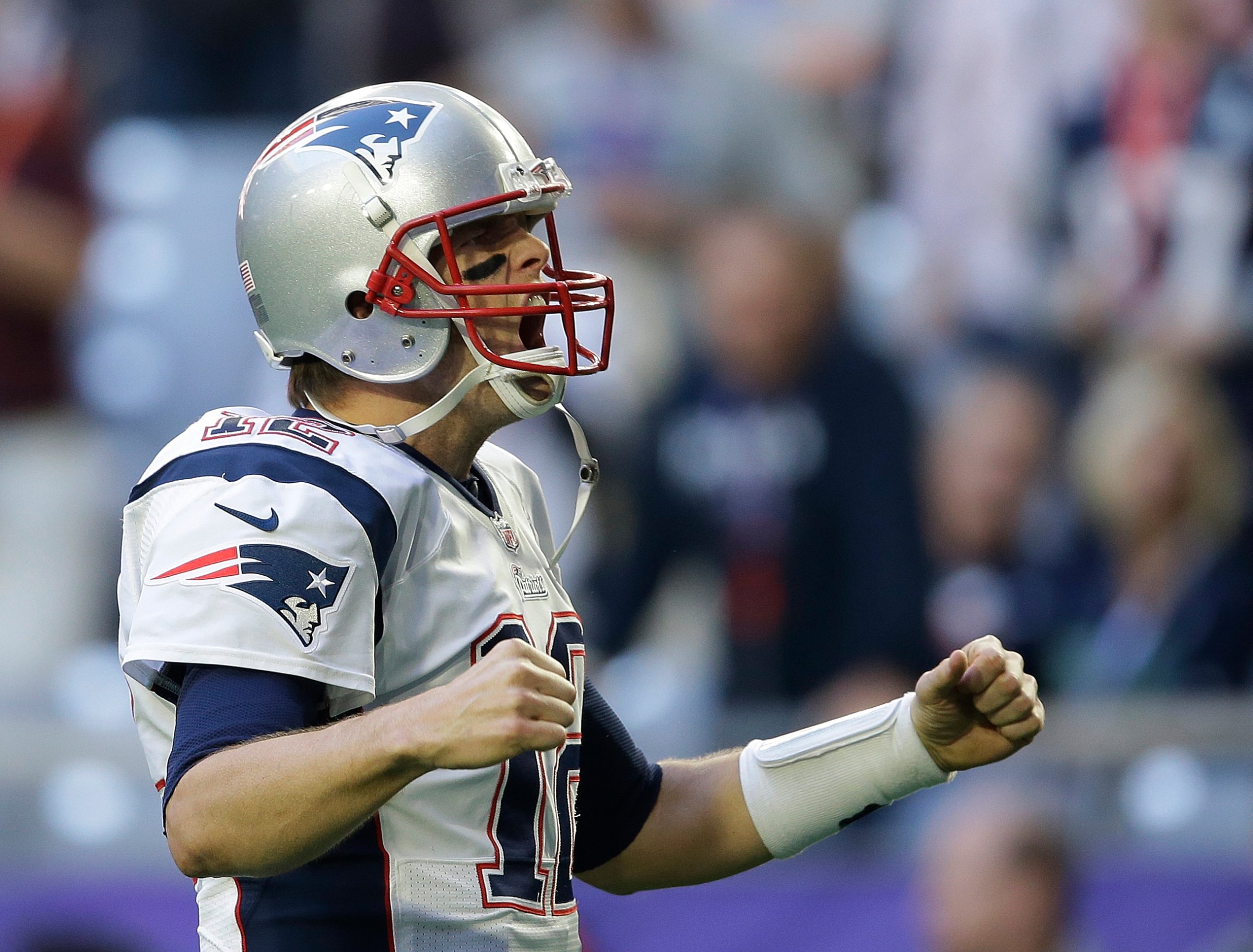 New England Patriots quarterback Tom Brady (12) yells before the NFL Super Bowl XLIX football game against the Seattle Seahawks on Sunday, Feb. 1, 2015, in Glendale, Ariz