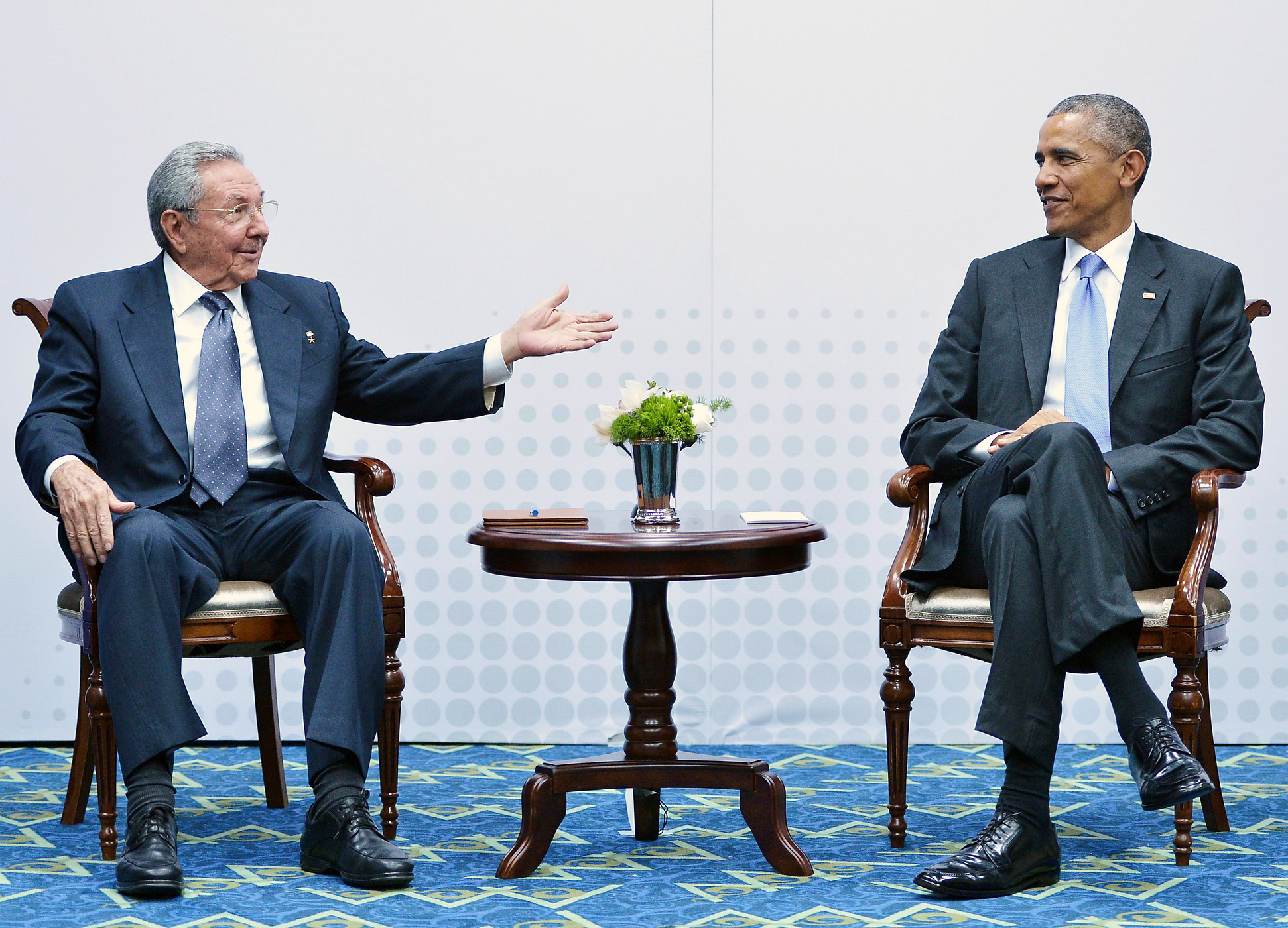 Cuba's President Raul Castro, left, speaks during a meeting with President Barack Obama on the sidelines of the Summit of the Americas at the ATLAPA Convention center on April 11, 2015 in Panama City, Panama. (Mandel Ngan—AFP/Getty Images)