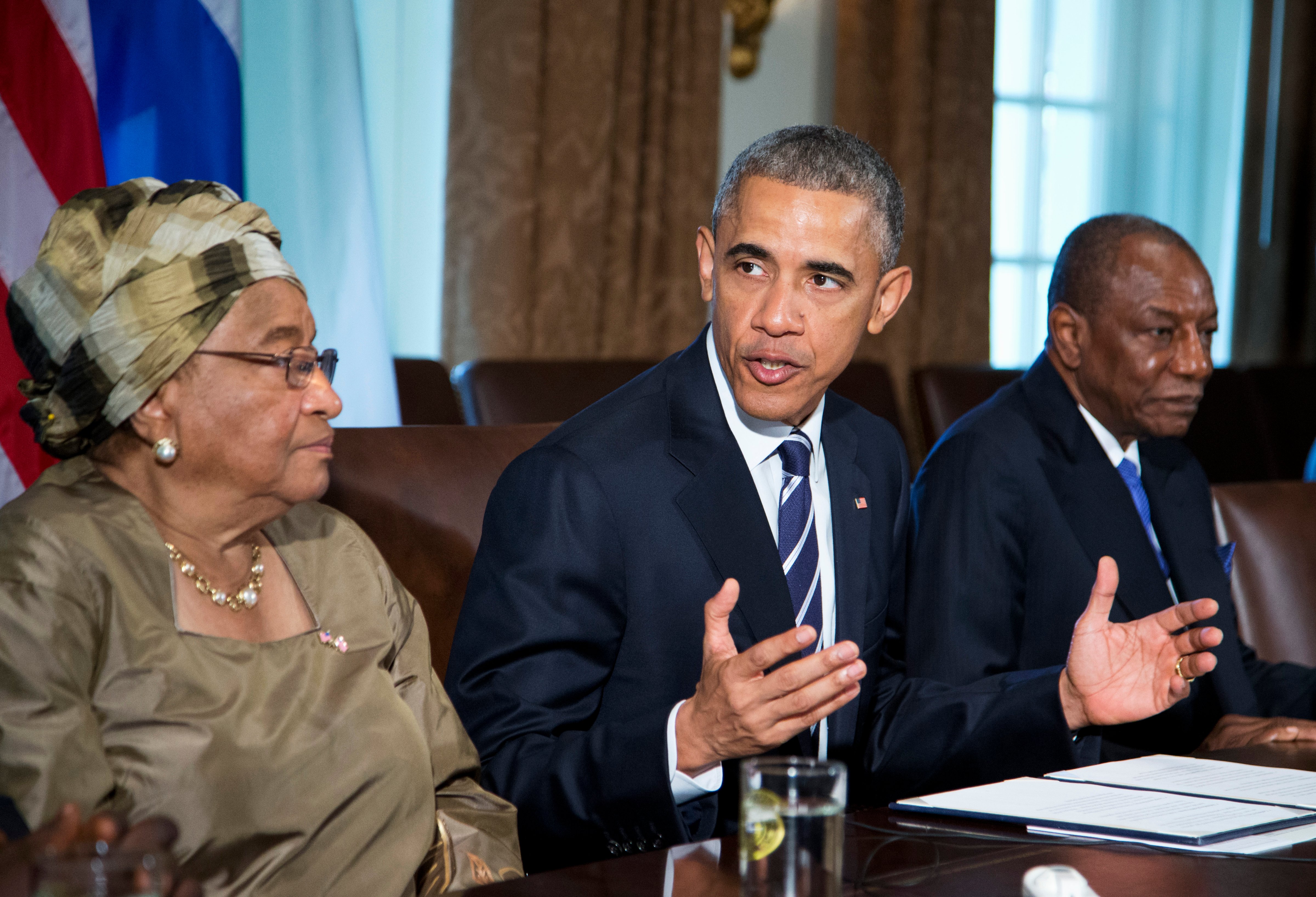 President Barack Obama, flanked by Liberian President Ellen Johnson Sirleaf, left, and Guinean President Alpha Condé, speaks in the Cabinet Room of the White House in Washington, Wednesday, April 15, 2015, to discuss the progress made in the international Ebola response. (Manuel Balce Ceneta—AP)