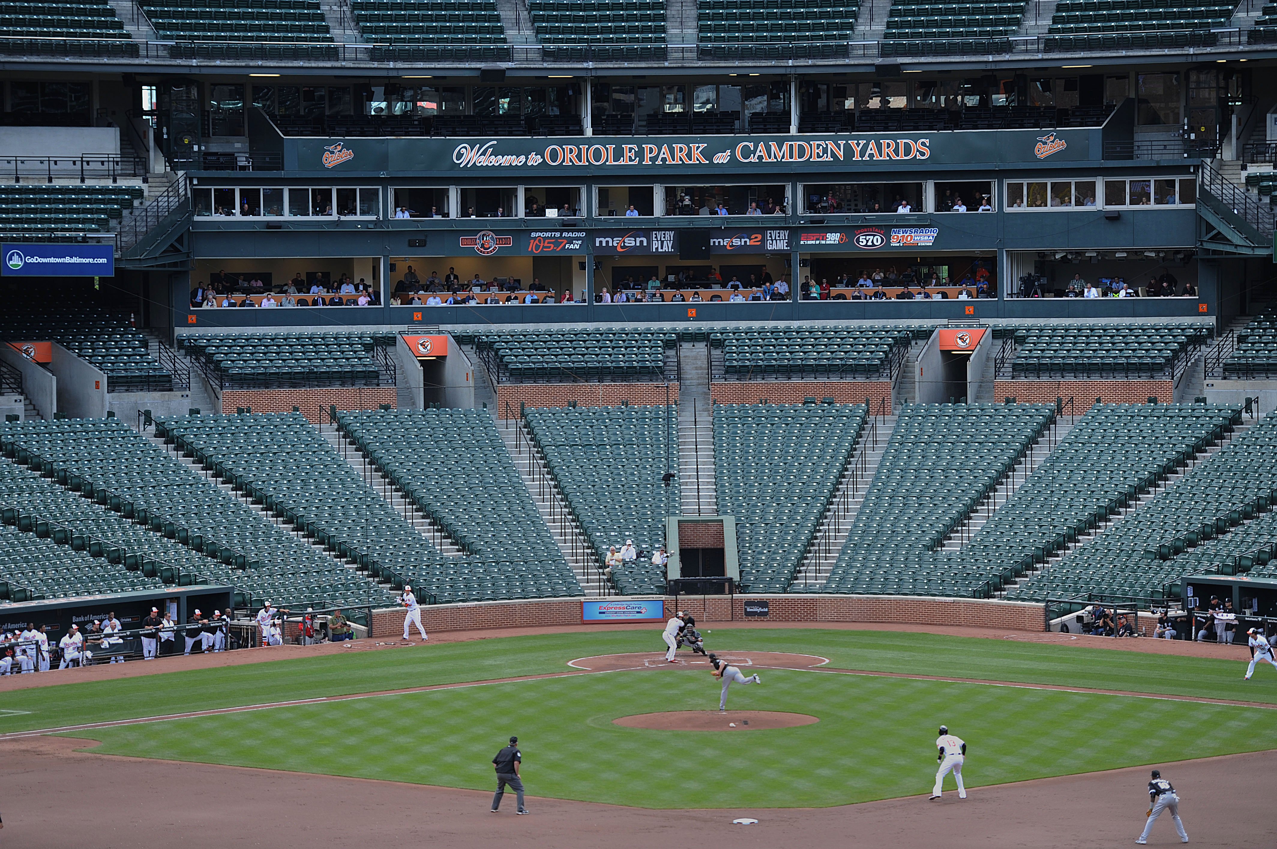 The Baltimore Orioles bat against the Chicago White Sox during a baseball game without fans on April 29, 2015, in Baltimore. Due to security concerns the game was closed to the public.