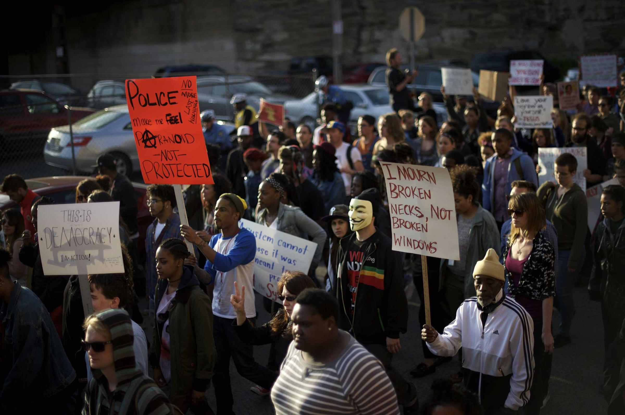 Demonstrators march to protest the death of Freddie Gray, in Philadelphia on April 30, 2015.