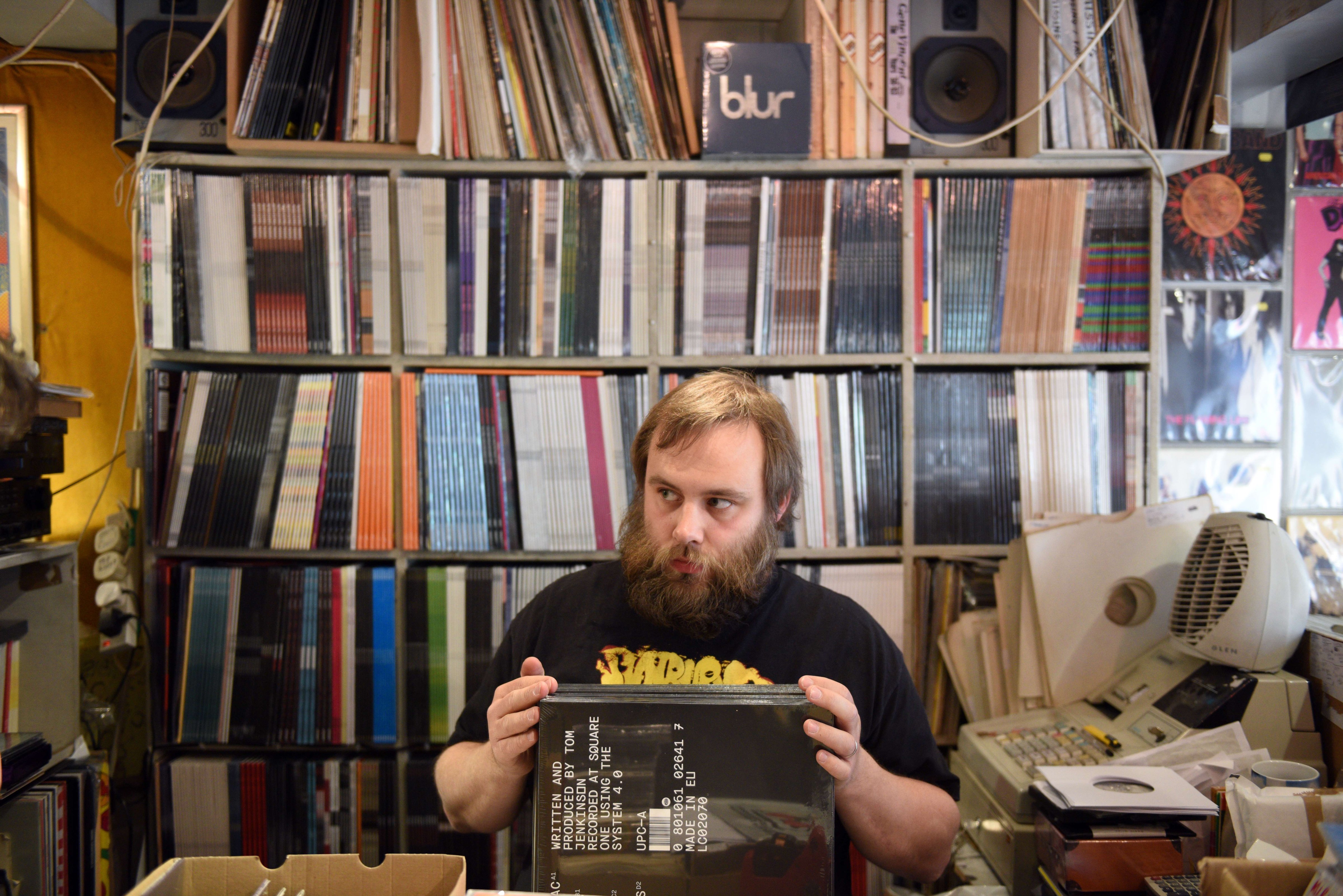 Joe Blanchard, an employee of the music shop 'Record Collector', arranges their vinyl stock ahead of tomorrow's 'Record Store Day' in Sheffield, Northern England on April 17, 2015. (Oli Scarff—AFP/Getty Images)