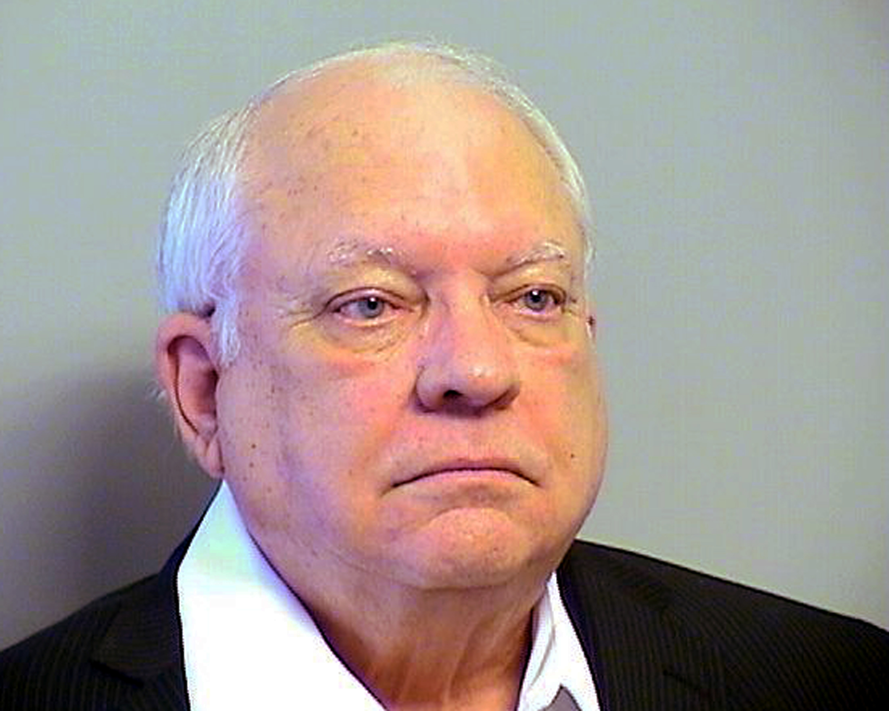 Robert Bates. The 73-year-old Oklahoma reserve sheriff's deputy, who authorities said fatally shot a suspect after confusing his stun gun and handgun, was booked into the county jail on a manslaughter charge in Tulsa, Okla. on April 14, 2015. (Tulsa County, Oklahoma, Sheriff&#039;s Office /AP)