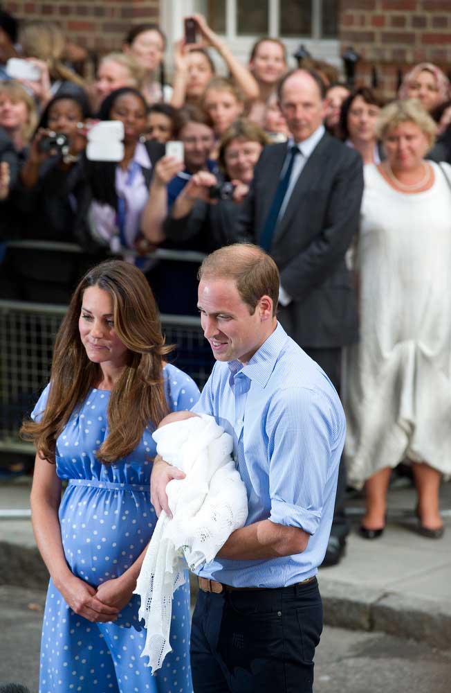 The Duchess of Cambridge and Prince William show their new born baby to the world media outside St Mary's Hospital in Paddington, London on July 23, 2013 after the Duchess gave birth to a baby boy. (Photo by Ben Cawthra/Sipa USA