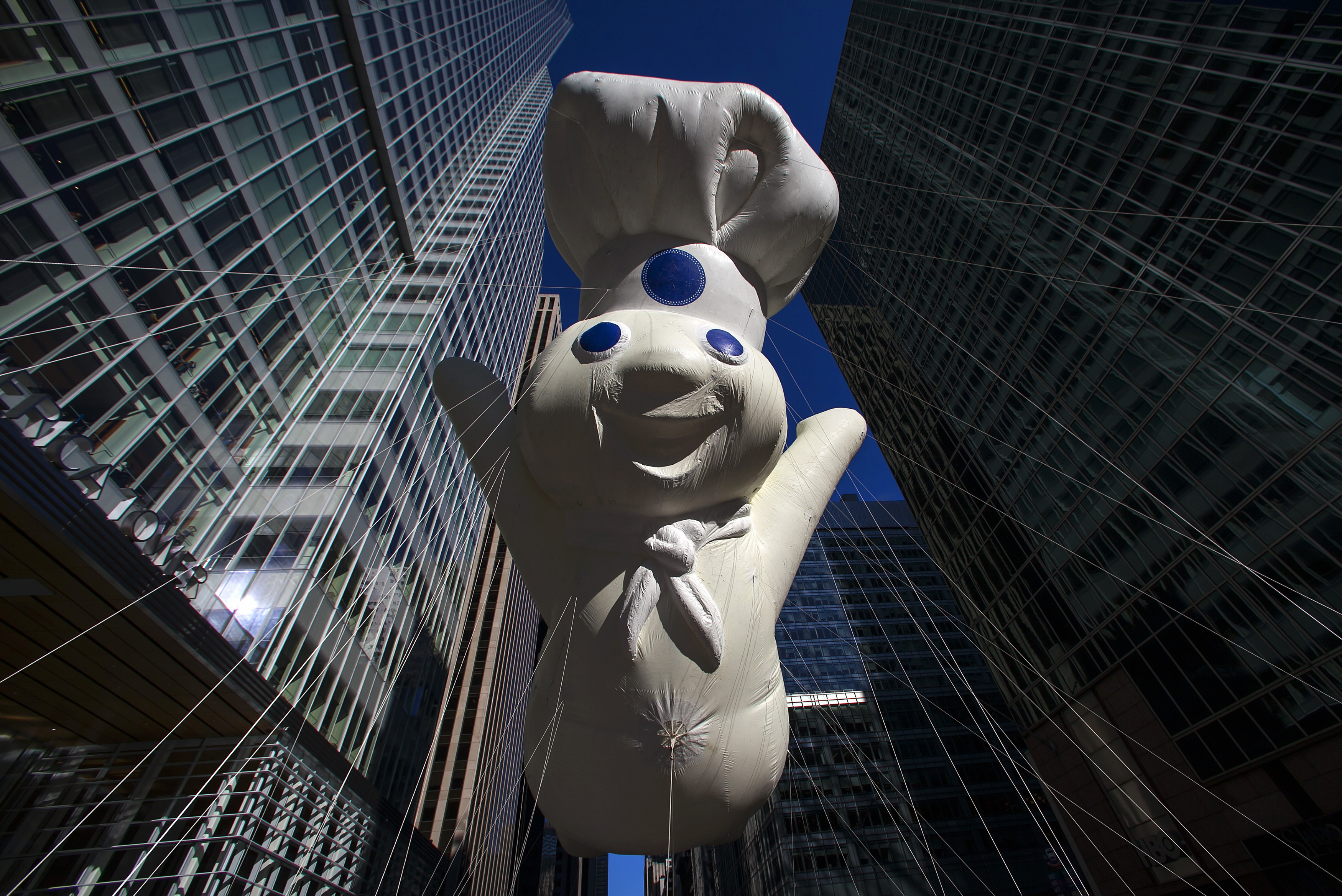 A Pillsbury Doughboy balloon float at the 87th Macy's Thanksgiving Day Parade in New York November 28, 2013