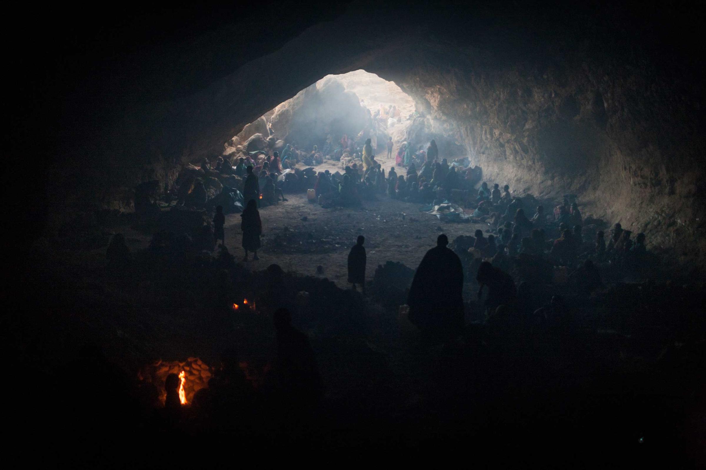 HundreHundreds of women and children seek shelter in a cave from the bombing by the Sudanese government's forces outside of the town of Sarong in Central Darfur, Sudan, March 2, 2015. Human rights groups estimate that over 100,000 people have been displaced in Darfur in the first few months of 2015. ds of women and children seek shelter in a cave from the bombing by the Sudanese government's forces outside of the town of Sarong in Central Darfur, Sudan on March 2, 2015.