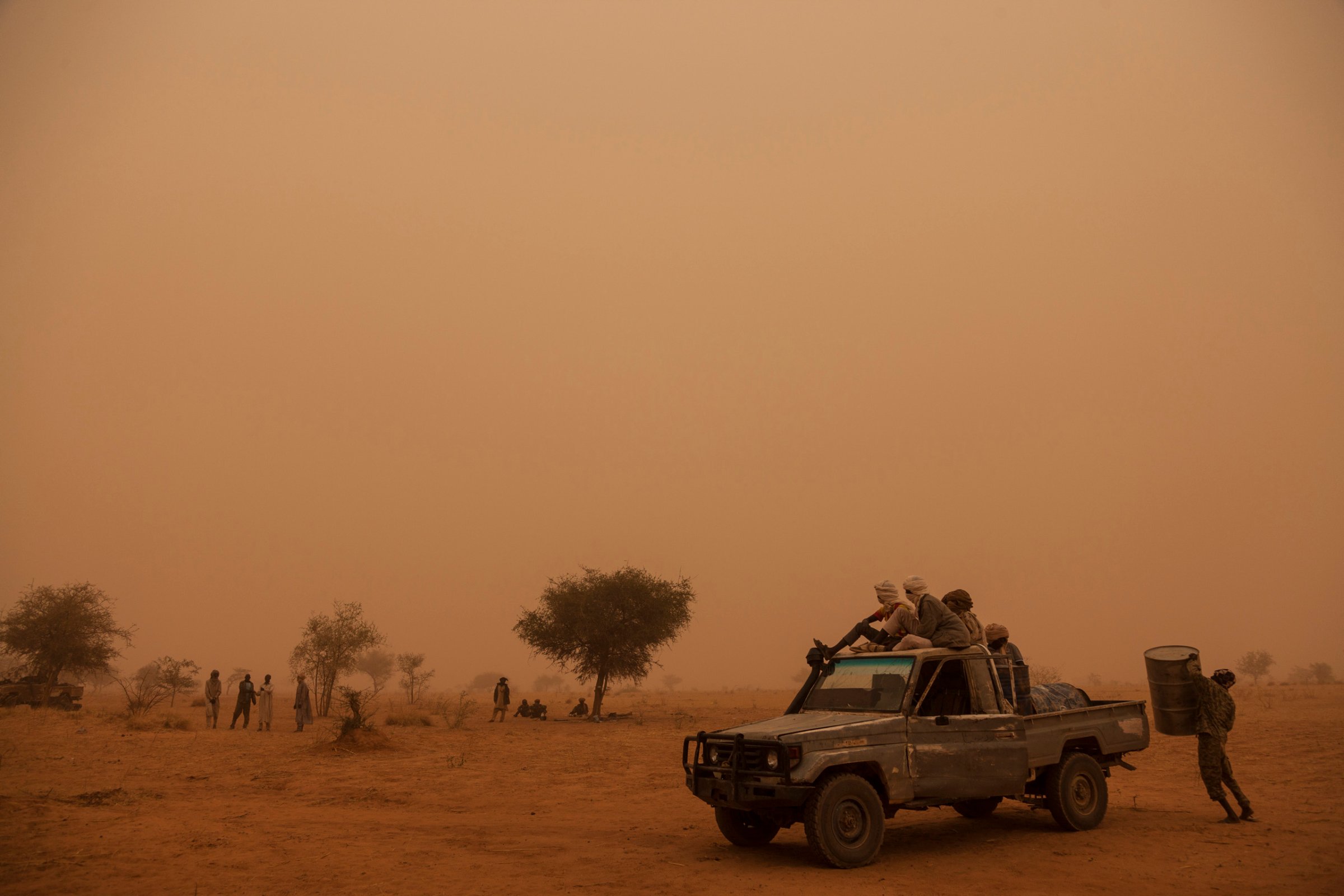 Rebel soldiers from the Sudan Liberation Army – Abdul Wahid (SLA-AW) prepare the truck to go for water in the middle of a sand storm in North Darfur, Sudan, on Feb. 24, 2015.