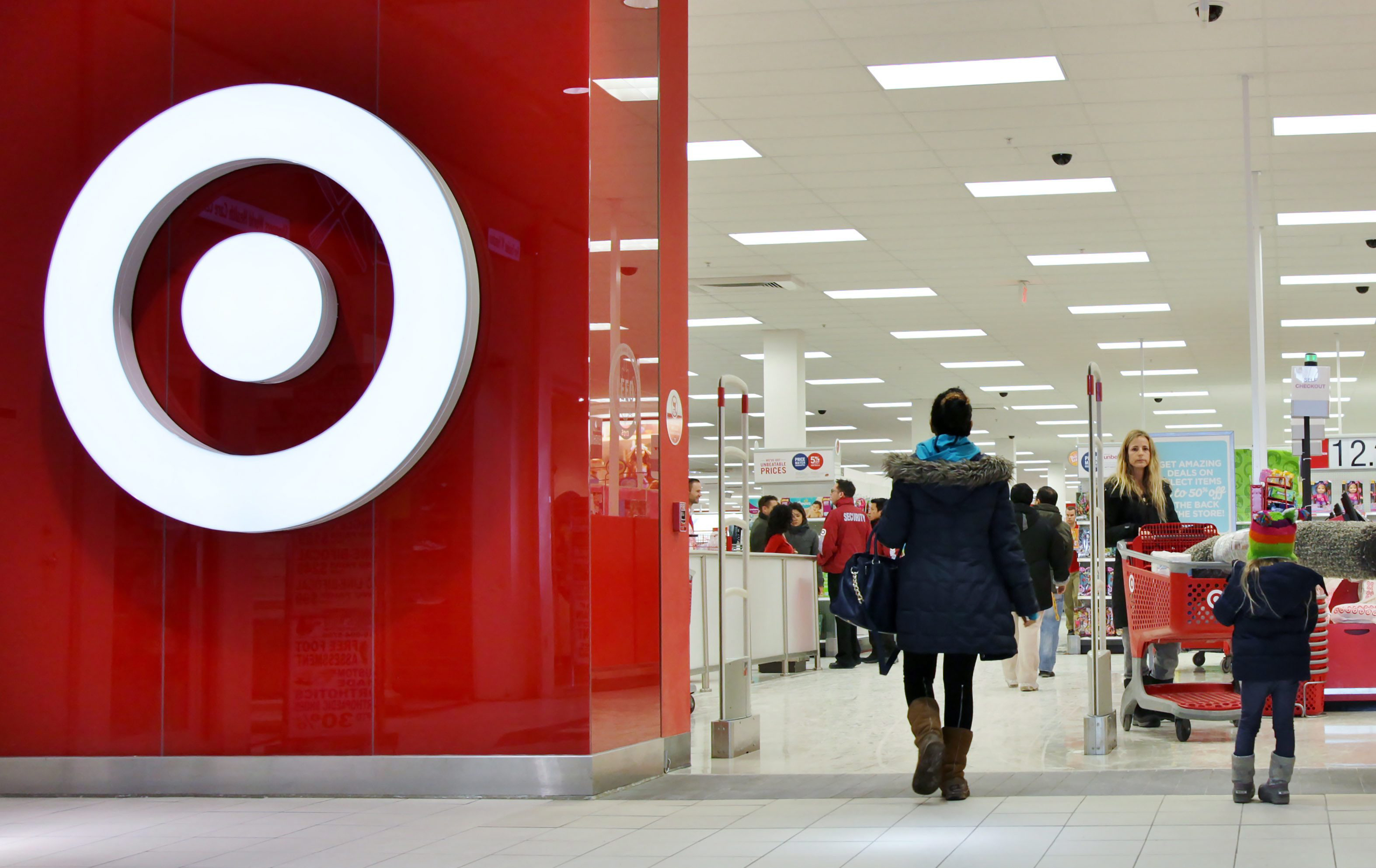 Shoppers enter a Target store in Toronto on Jan. 15, 2015. (Colin Perkel—AP)