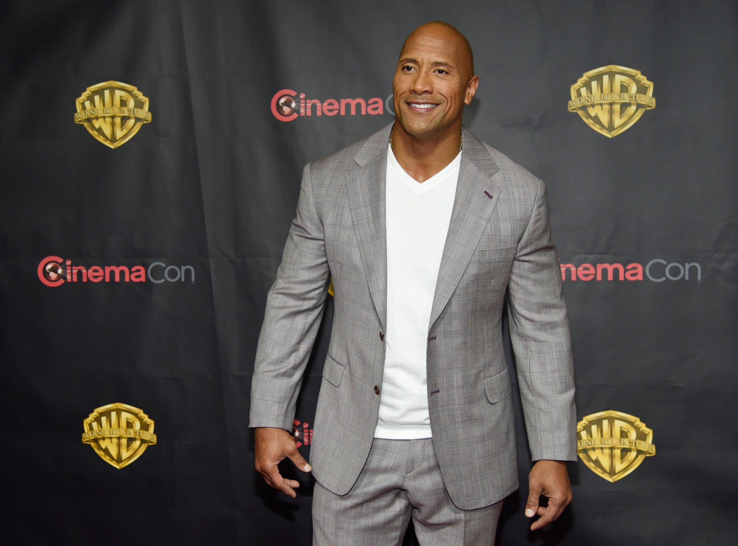 Dwayne Johnson, a cast member in the upcoming film "San Andreas," poses before the Warner Bros. presentation at CinemaCon 2015 at Caesars Palace on Tuesday, April 21, 2015, in Las Vegas