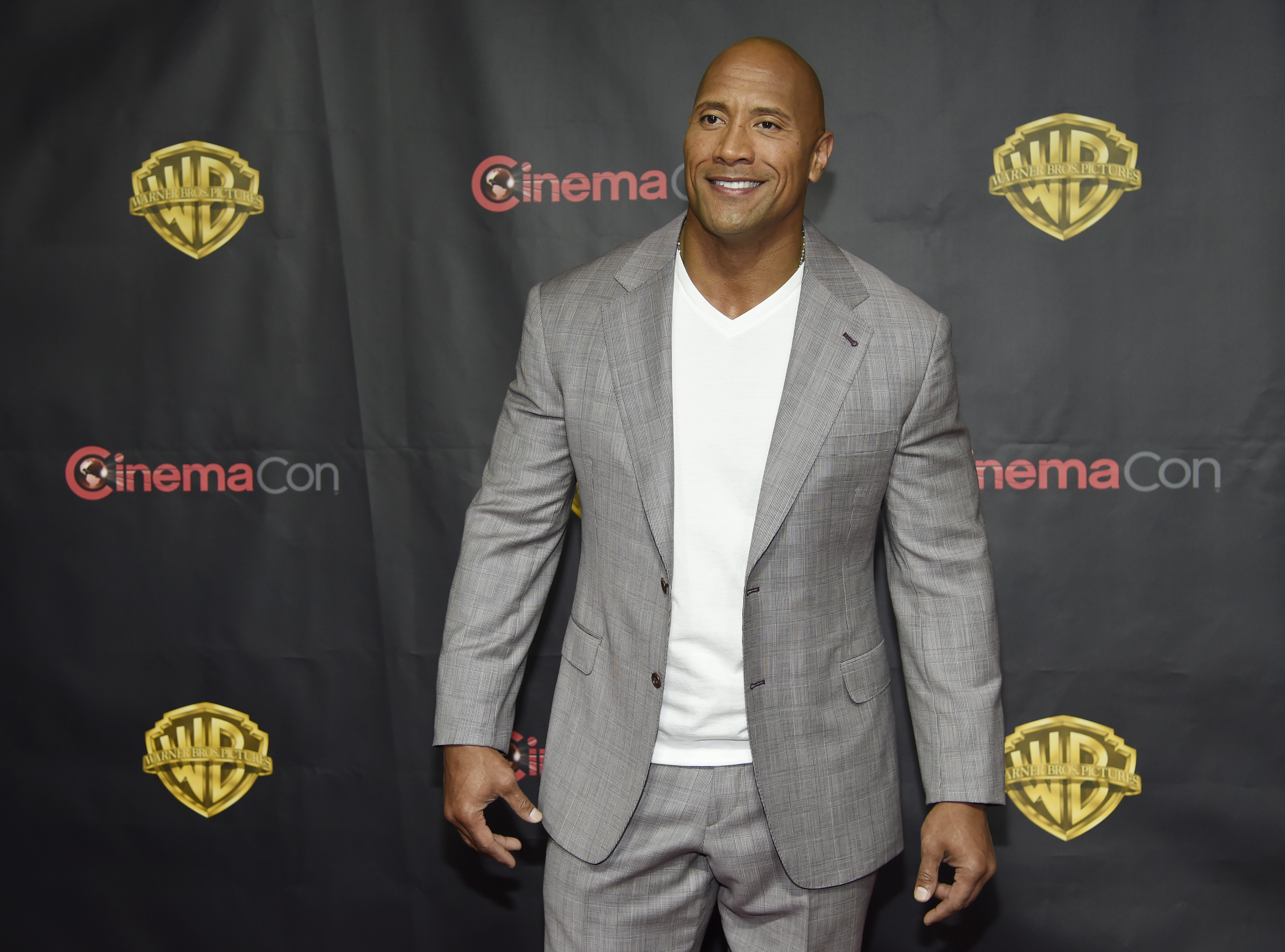 Dwayne Johnson, a cast member in the upcoming film "San Andreas,"  poses before the Warner Bros. presentation at CinemaCon 2015 at Caesars Palace on Tuesday, April 21, 2015, in Las Vegas