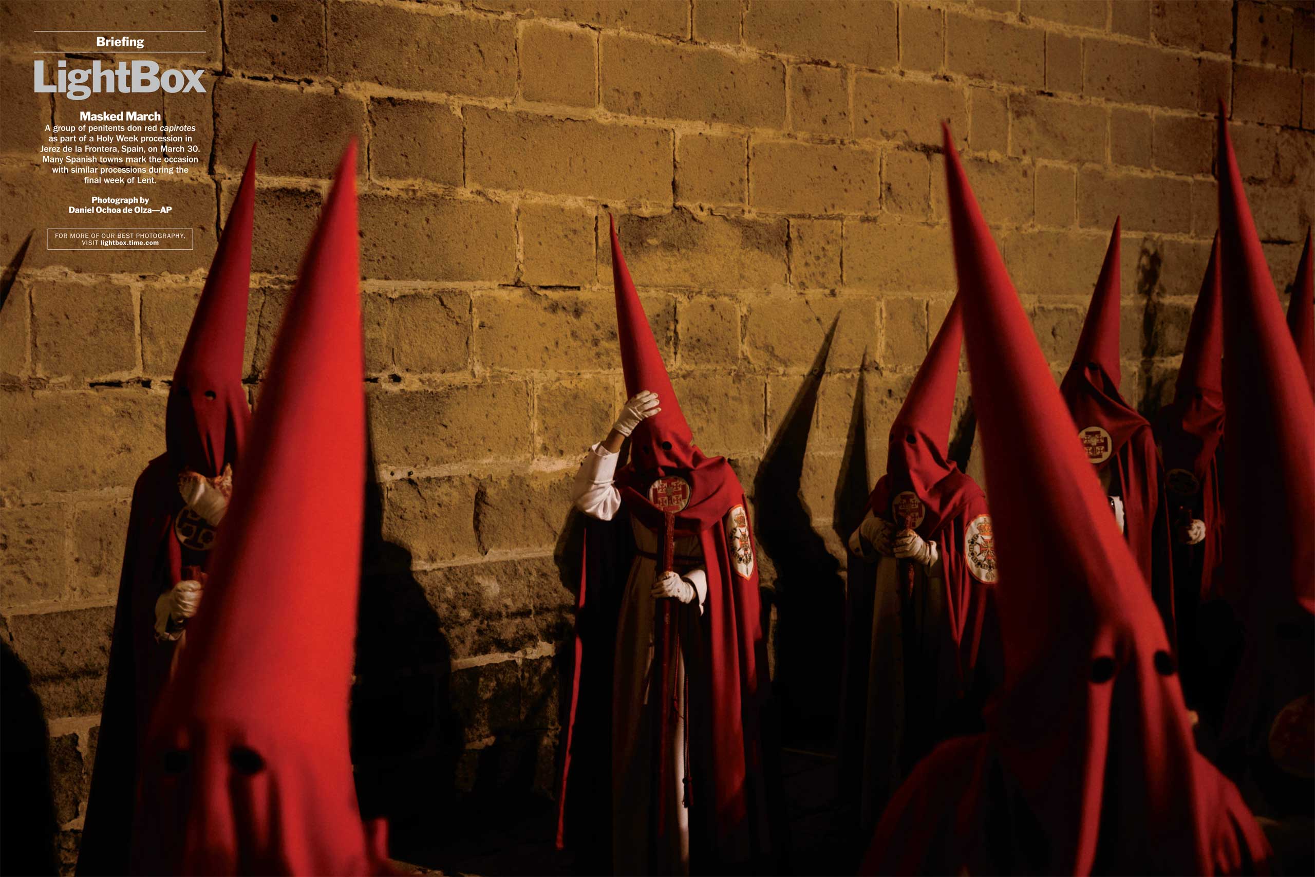 Photograph by Daniel Ochoa de Olza—APA group of penitents don red capirotes as part of a Holy Week procession in Jerez de la Frontera, Spain, on March 30. Many Spanish towns mark the occasion with similar processions during the final week of Lent. (TIME issue April 13, 2015)