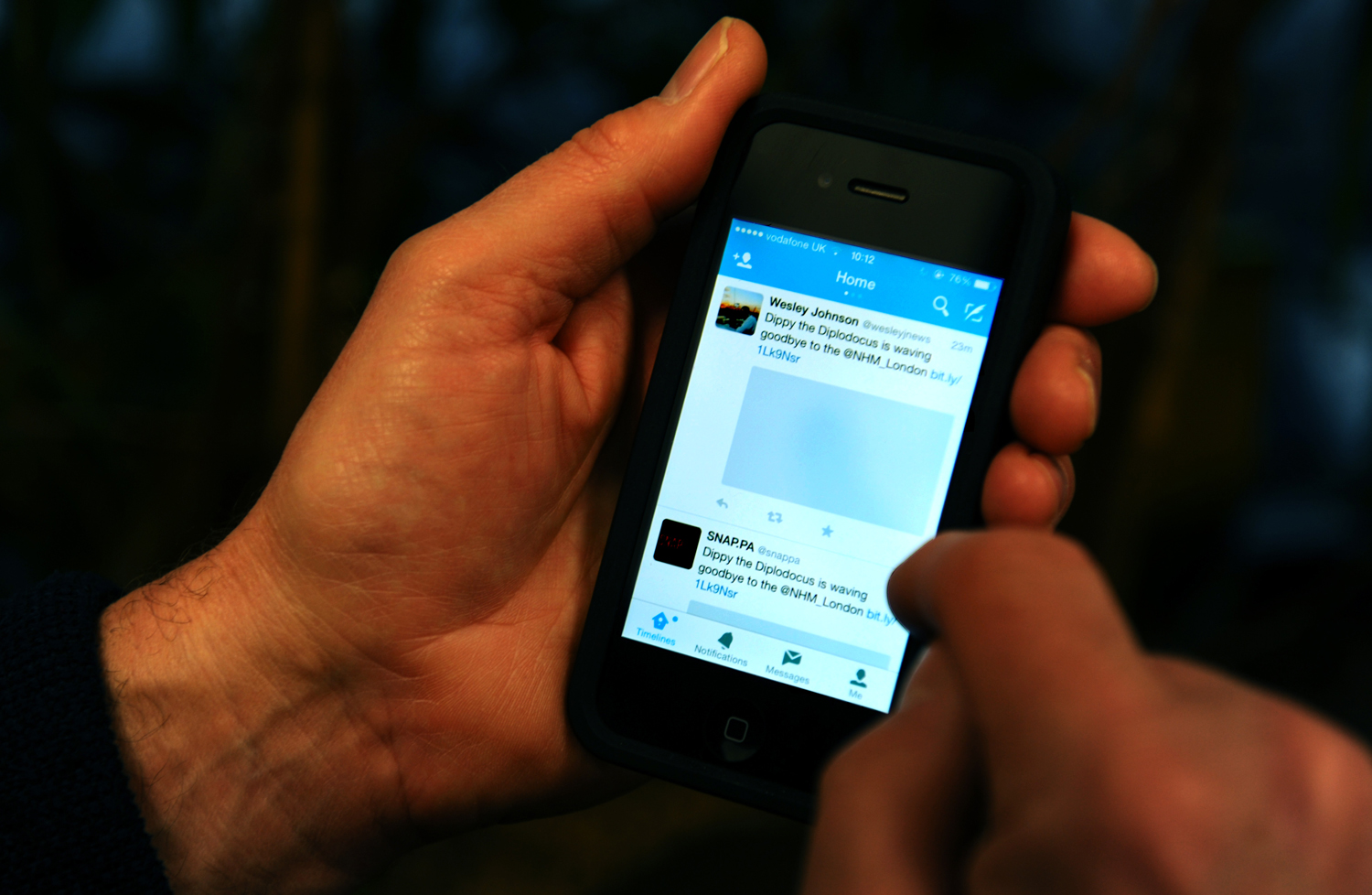 The Twitter App is shown on an Apple iPhone 4S. (Lauren Hurley — Association Images)
