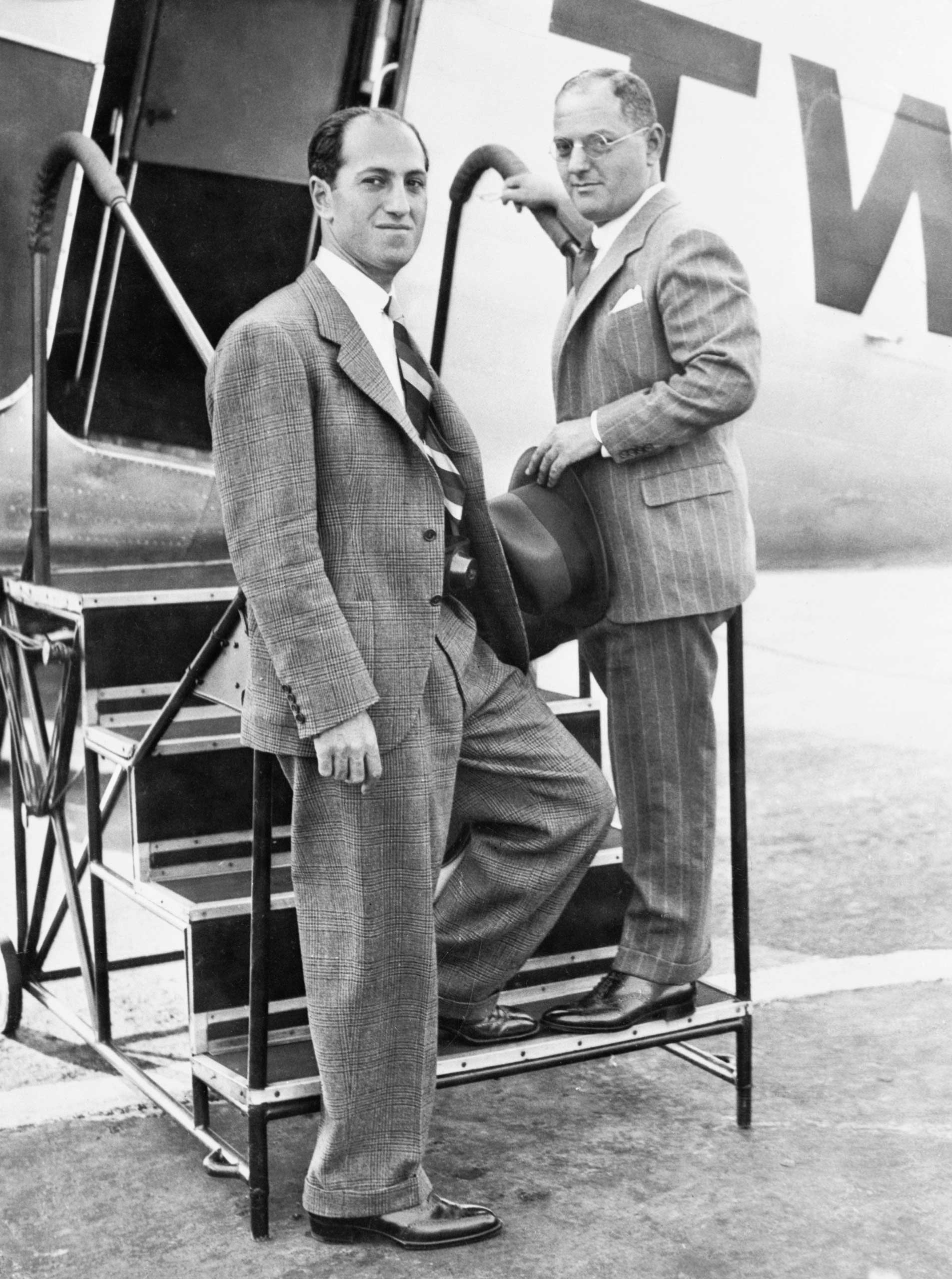 Gershwin Brothers Stepping onto TWA Airplane