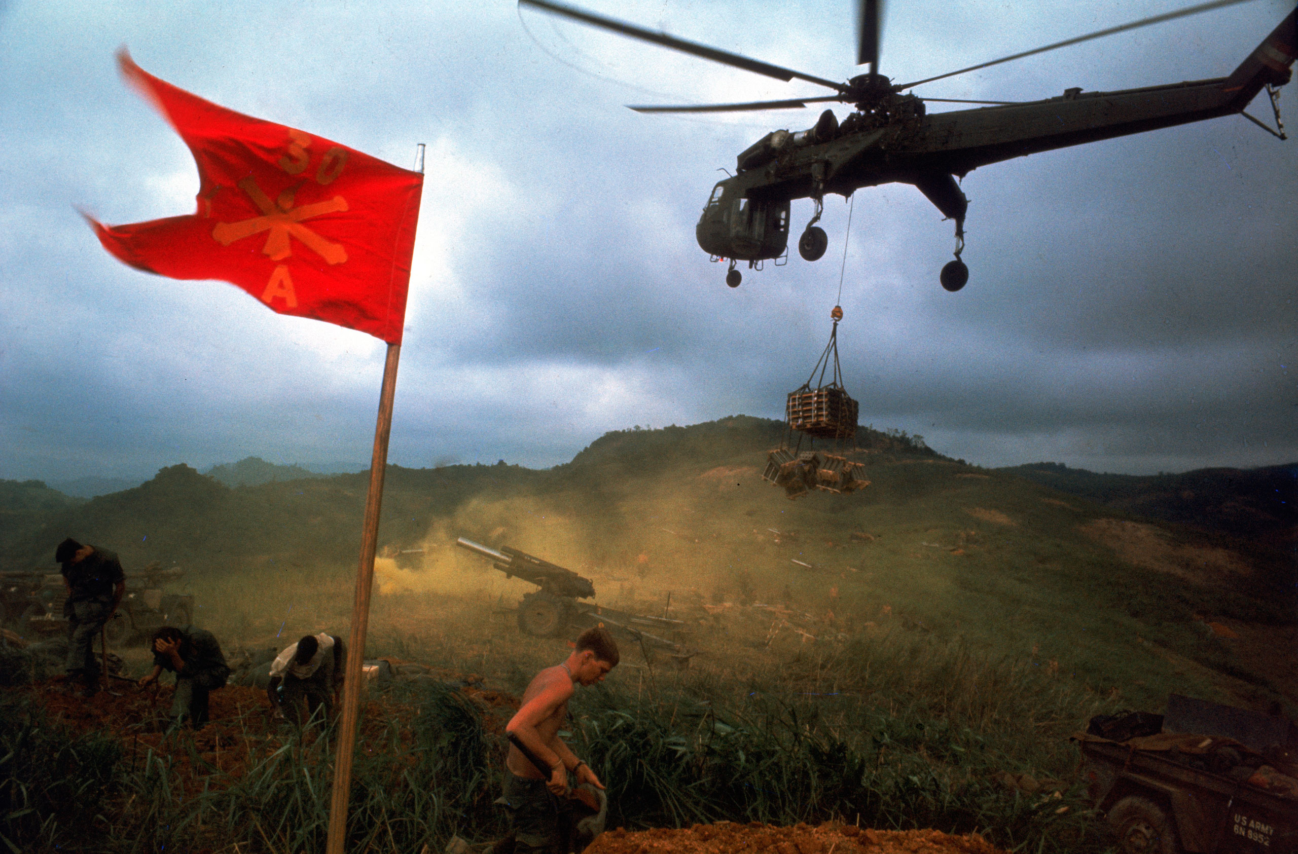 An American 1st Air Cavalry helicopter airlifts supplies into a Marine outpost during Operation Pegasus in Vietnam in 1968.