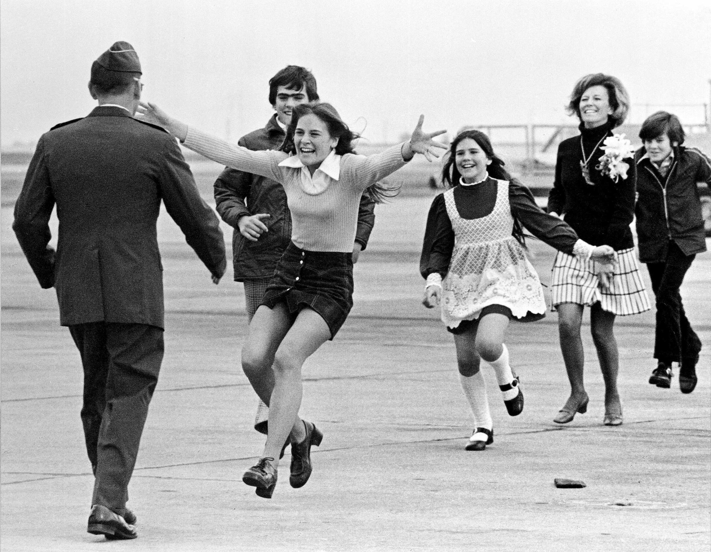 Released prisoner of war Lt. Col. Robert L. Stirm is greeted by his family at Travis Air Force Base in Fairfield, Calif., as he returns home from the Vietnam War on March 17, 1973.