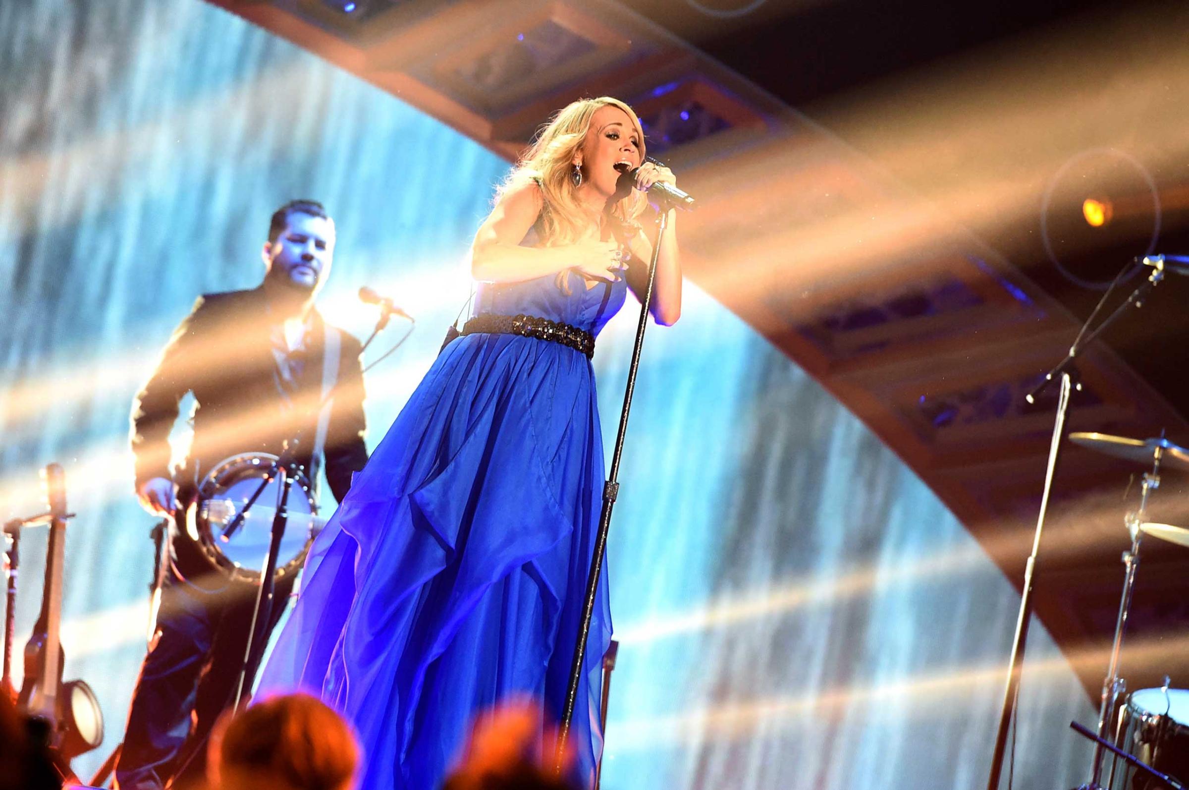 Carrie Underwood performs at the 2014 American Country Countdown Awards at Music City Center in Nashville on Dec. 15, 2014.