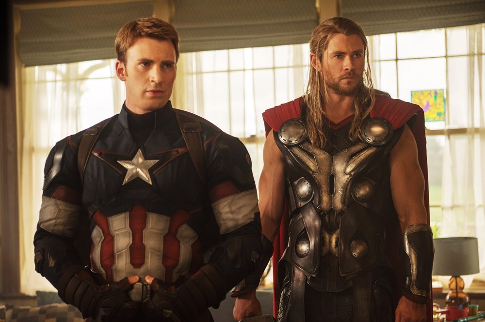 Chris Evans (L) as Captain America and Chris Hemsworth (R) as Thor in AVENGERS: AGE OF ULTRON. (Walt Disney Pictures)