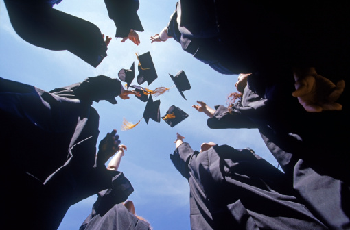 graduates-throwing-caps
